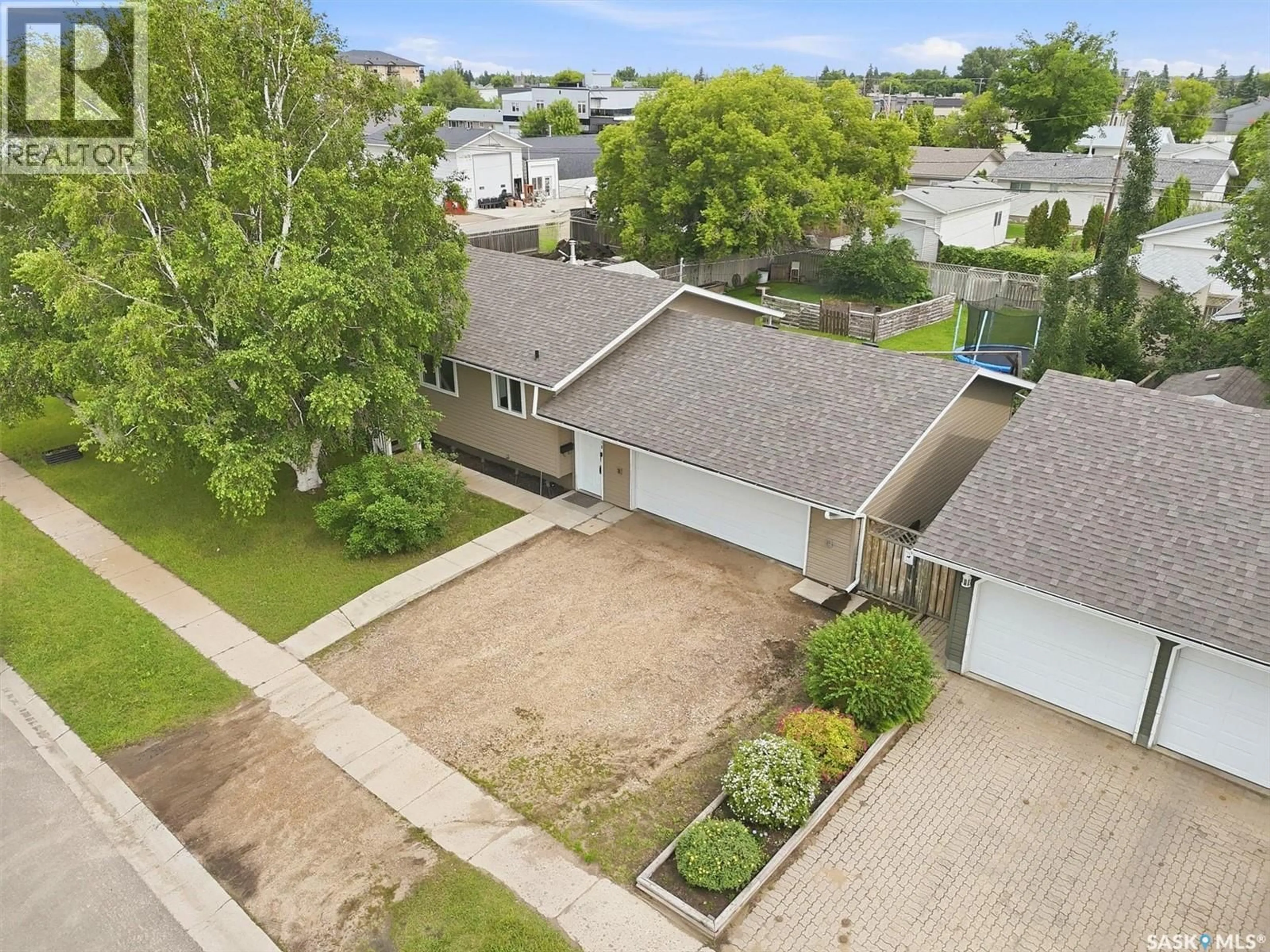 A pic from outside/outdoor area/front of a property/back of a property/a pic from drone, street for 418 NORTH RAILWAY STREET, Warman Saskatchewan S0K4S0