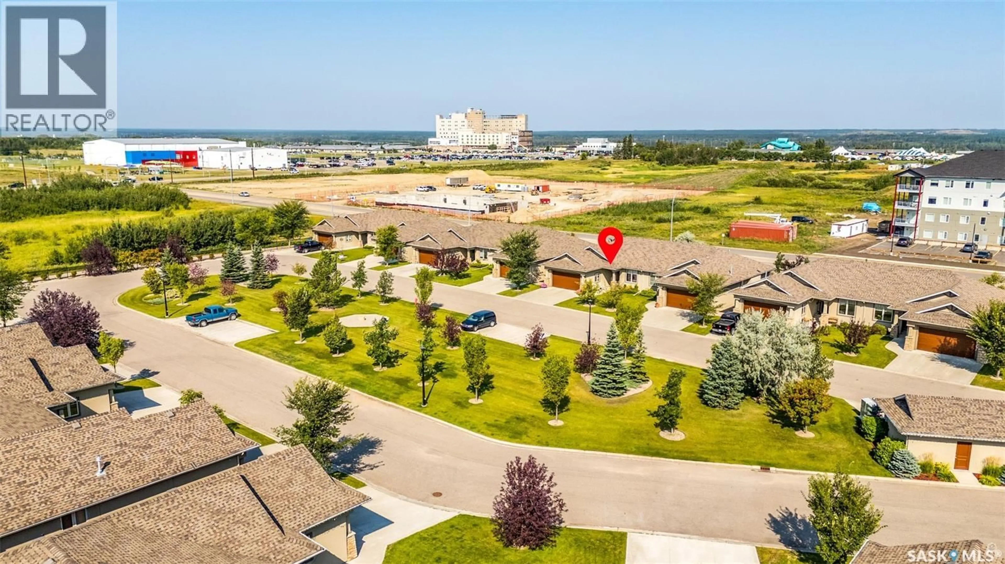 A pic from outside/outdoor area/front of a property/back of a property/a pic from drone, unknown for 18 - 2805 LAKEVIEW DRIVE, Prince Albert Saskatchewan S6W0A4