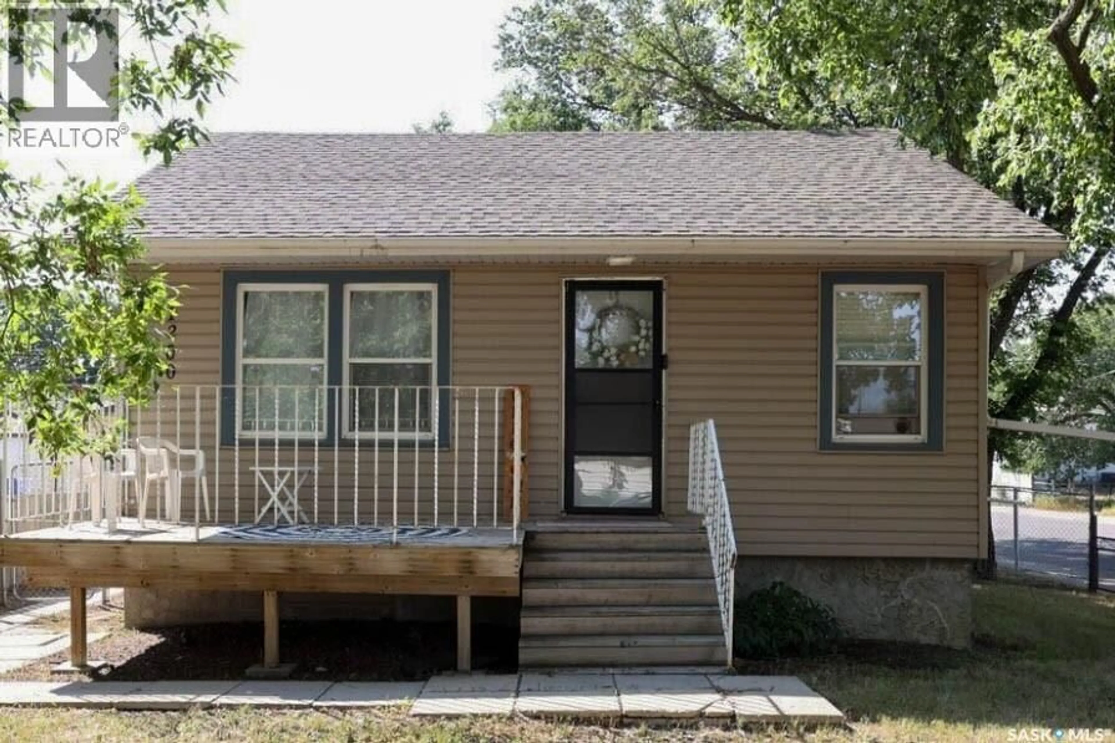 Home with vinyl exterior material, street for 1200 ATKINSON STREET, Regina Saskatchewan S4N3V6