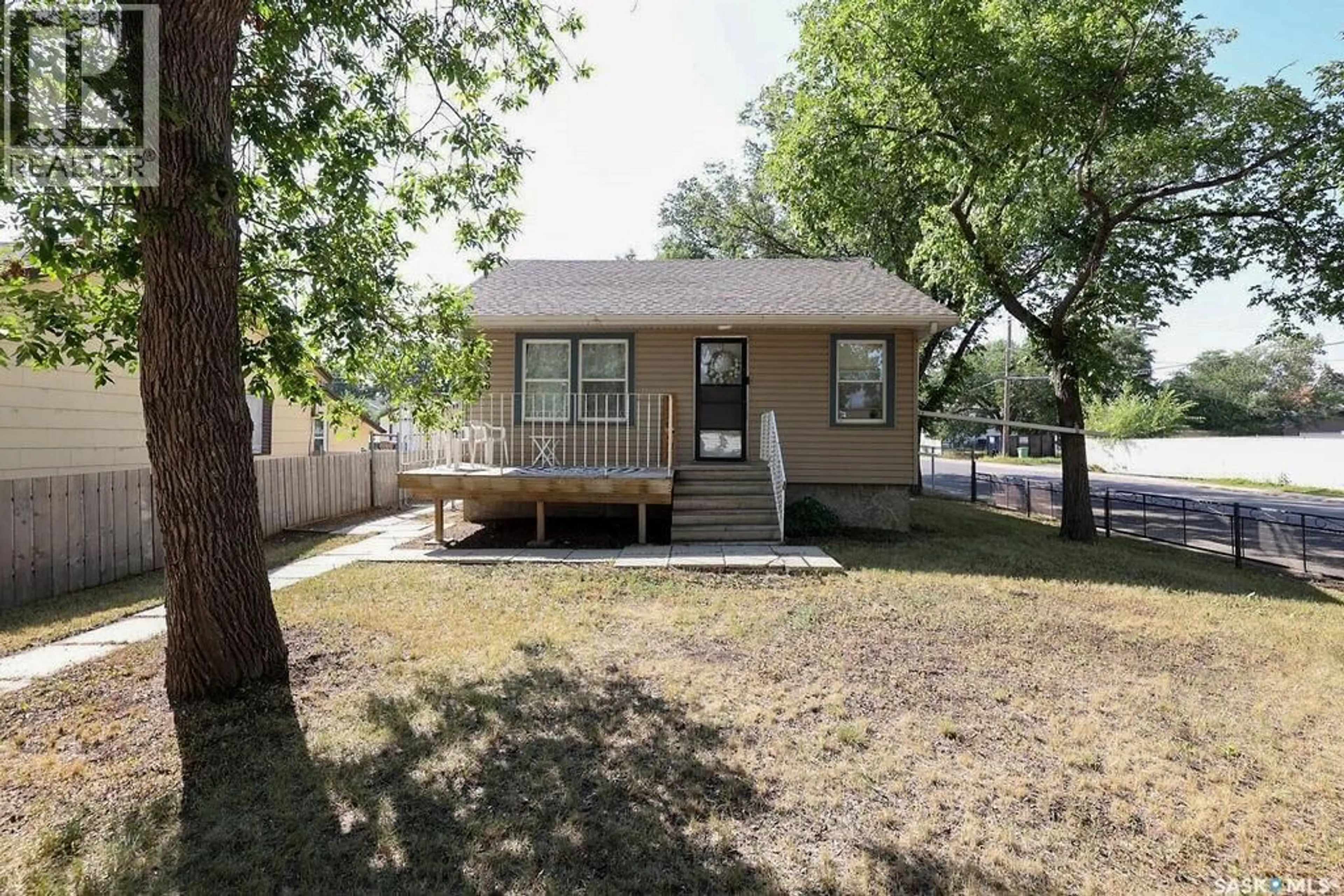 Home with vinyl exterior material, street for 1200 ATKINSON STREET, Regina Saskatchewan S4N3V6
