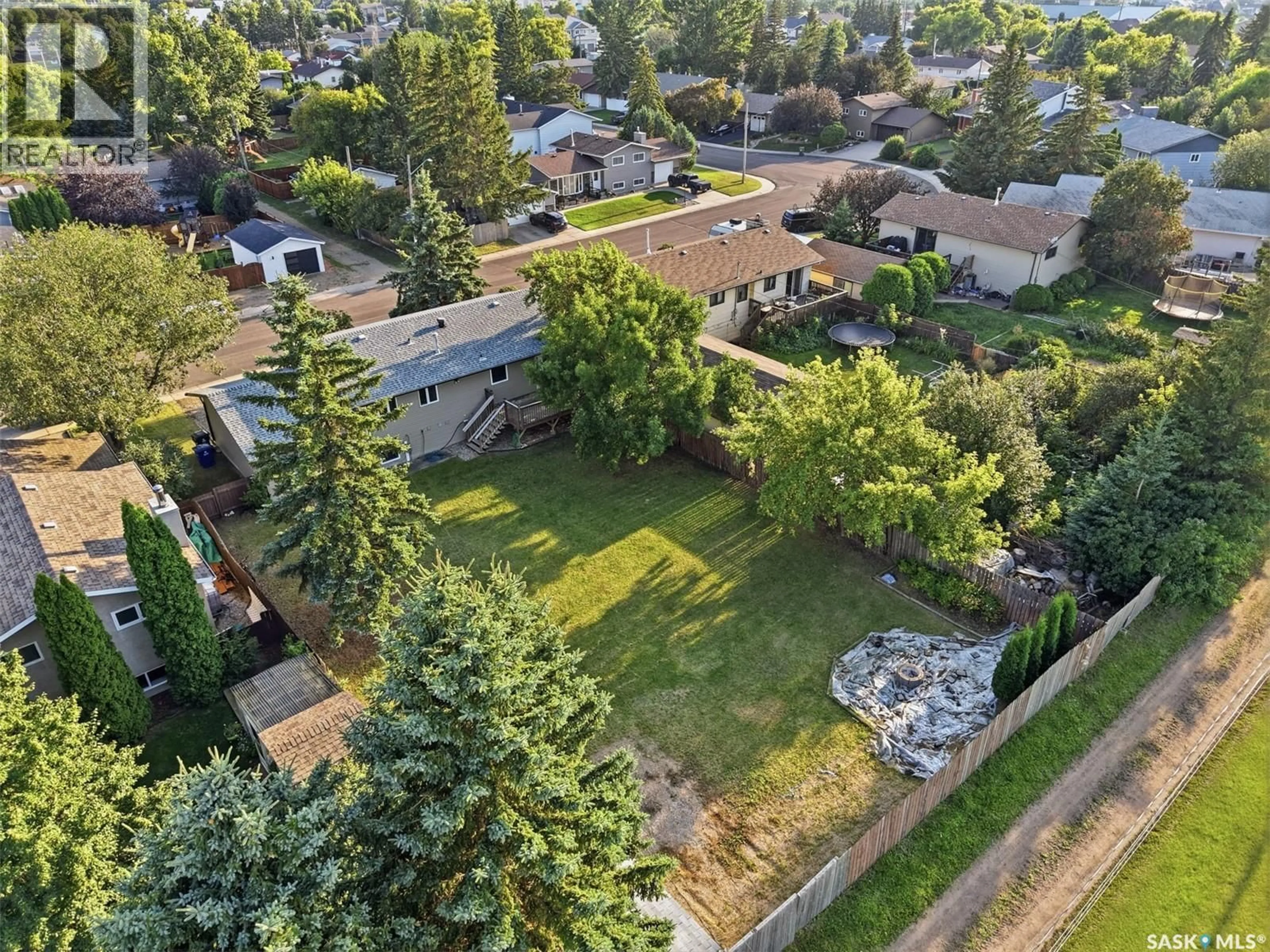 A pic from outside/outdoor area/front of a property/back of a property/a pic from drone, unknown for 525 WILKEN CRESCENT, Warman Saskatchewan S0K4S0