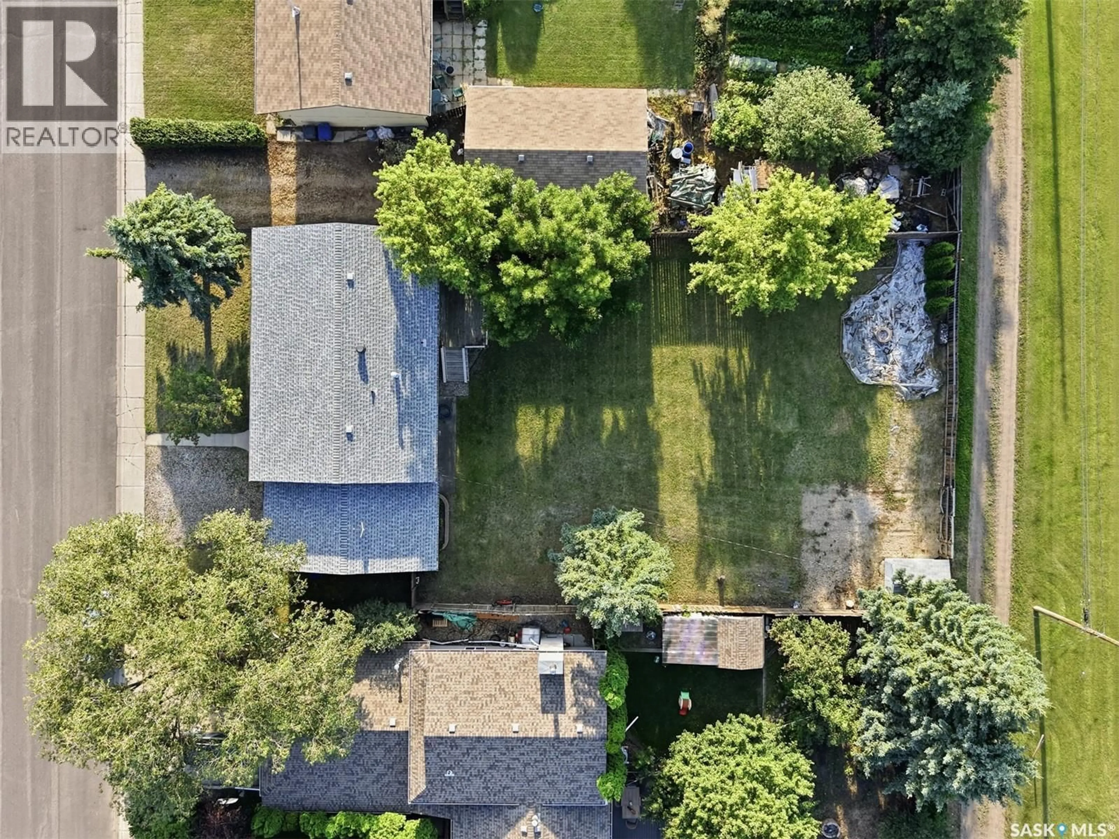A pic from outside/outdoor area/front of a property/back of a property/a pic from drone, street for 525 WILKEN CRESCENT, Warman Saskatchewan S0K4S0