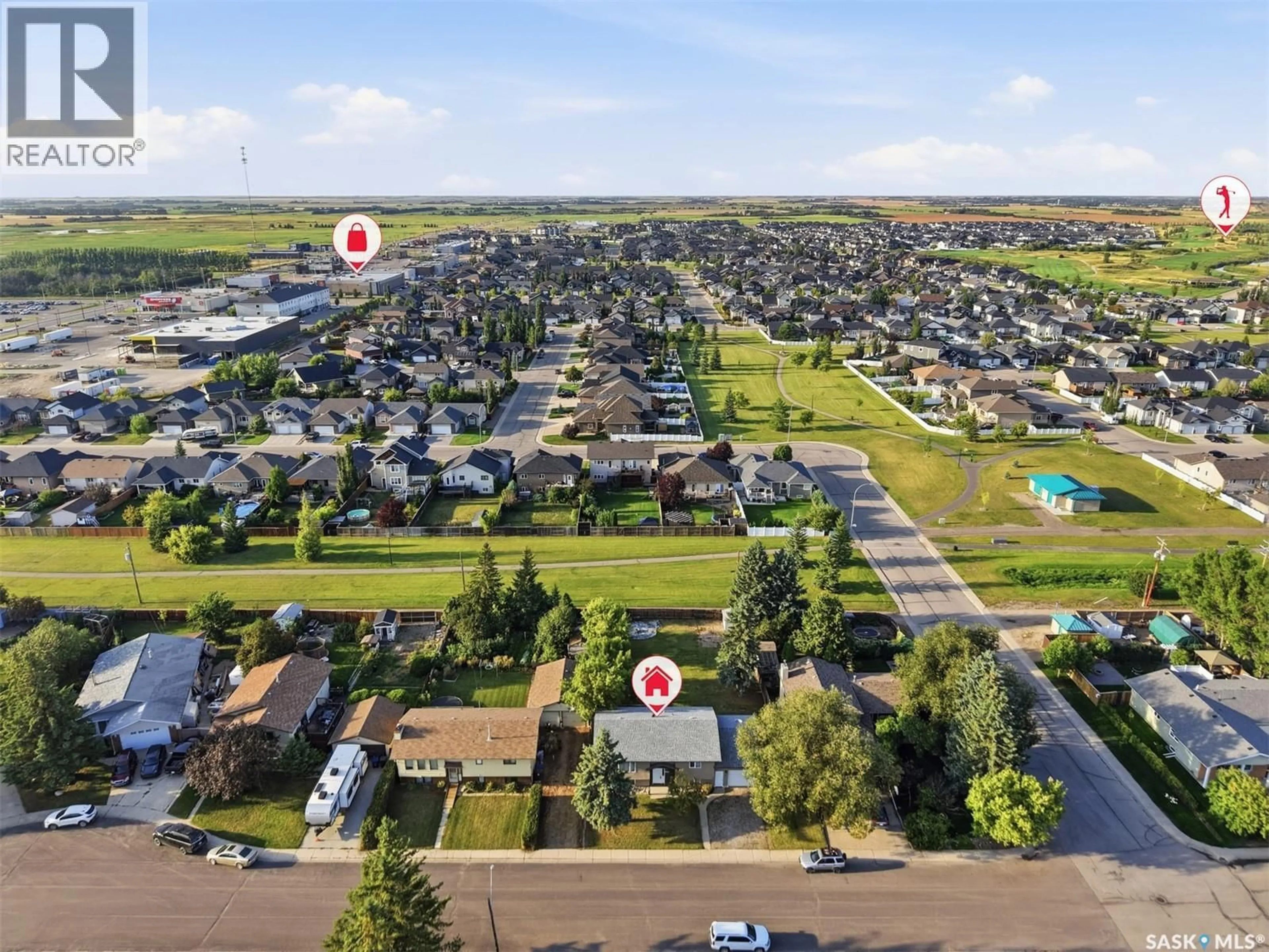 A pic from outside/outdoor area/front of a property/back of a property/a pic from drone, unknown for 525 WILKEN CRESCENT, Warman Saskatchewan S0K4S0