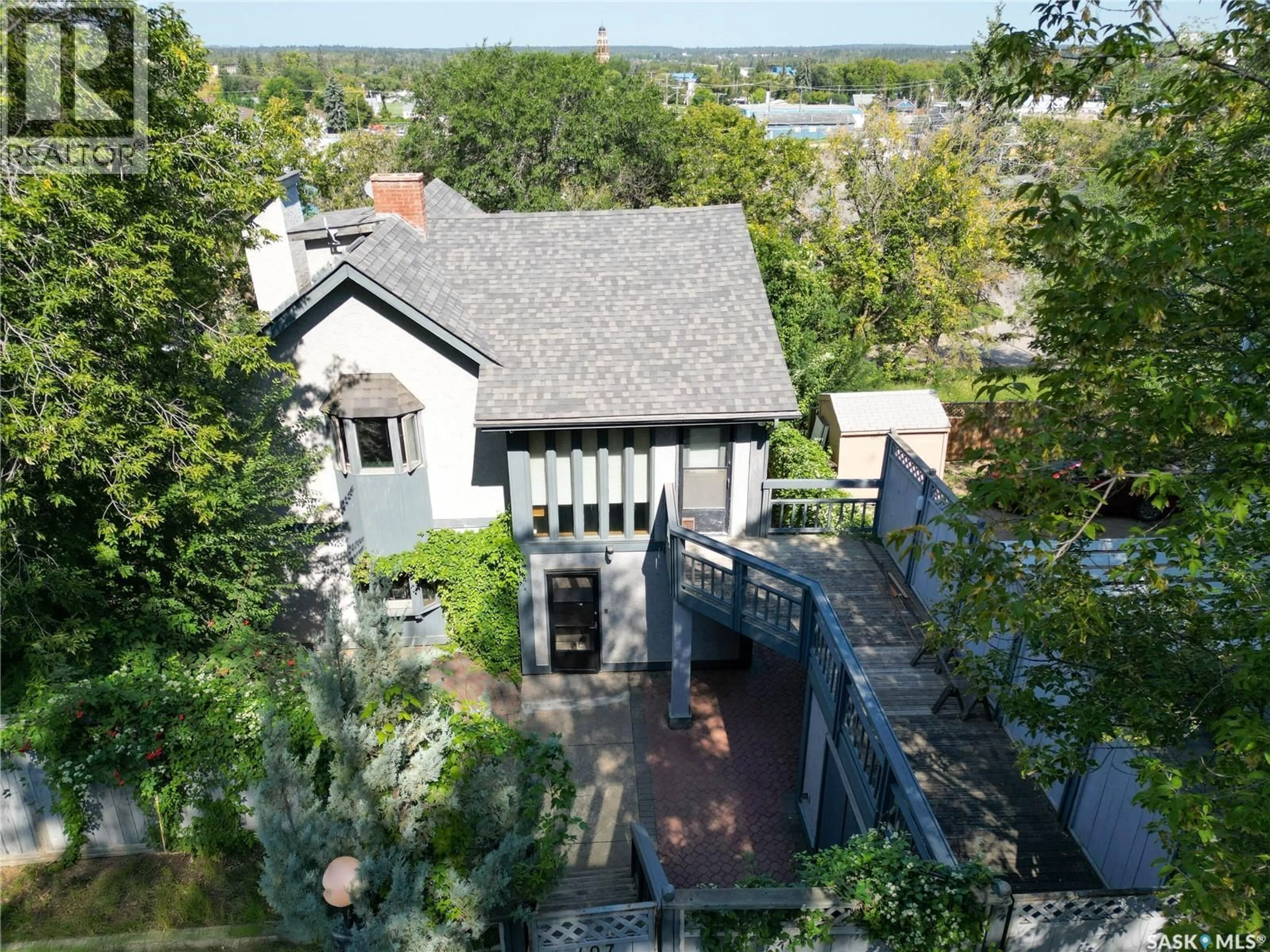 A pic from outside/outdoor area/front of a property/back of a property/a pic from drone, street for 407 18TH STREET, Prince Albert Saskatchewan S6V4A4