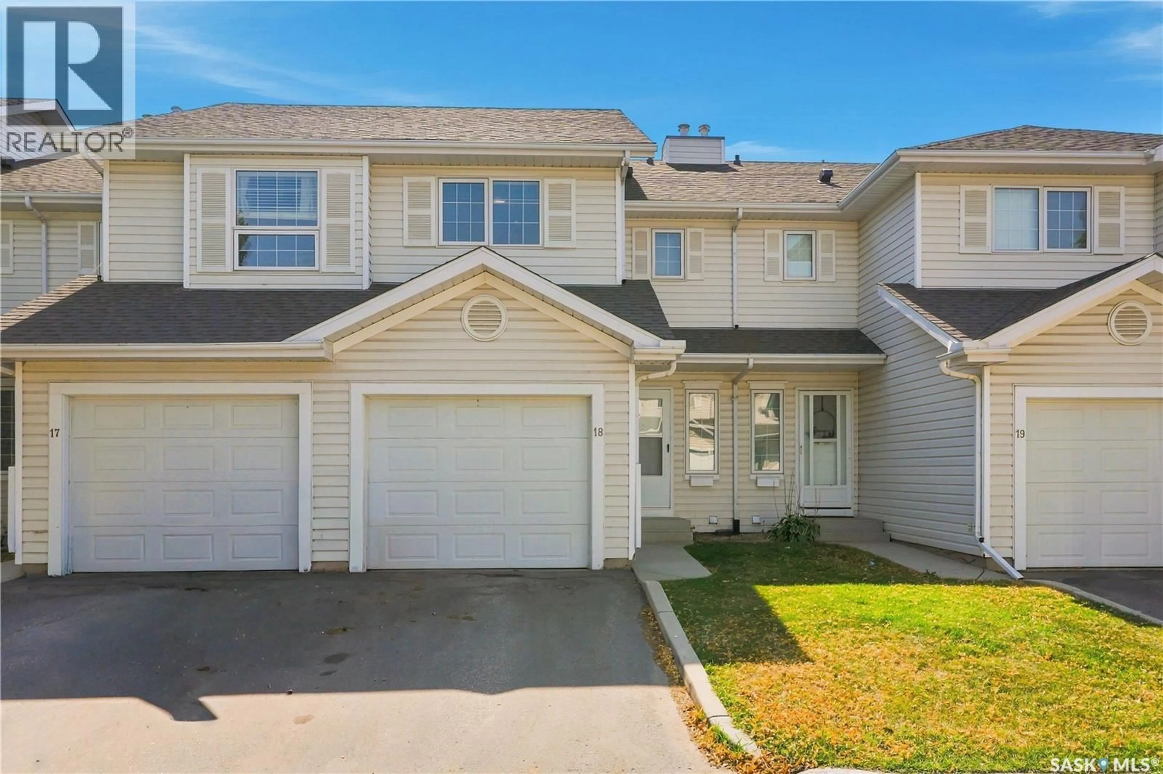 Home with vinyl exterior material, street for 18 110 KEEVIL CRESCENT, Saskatoon Saskatchewan S7N4N8