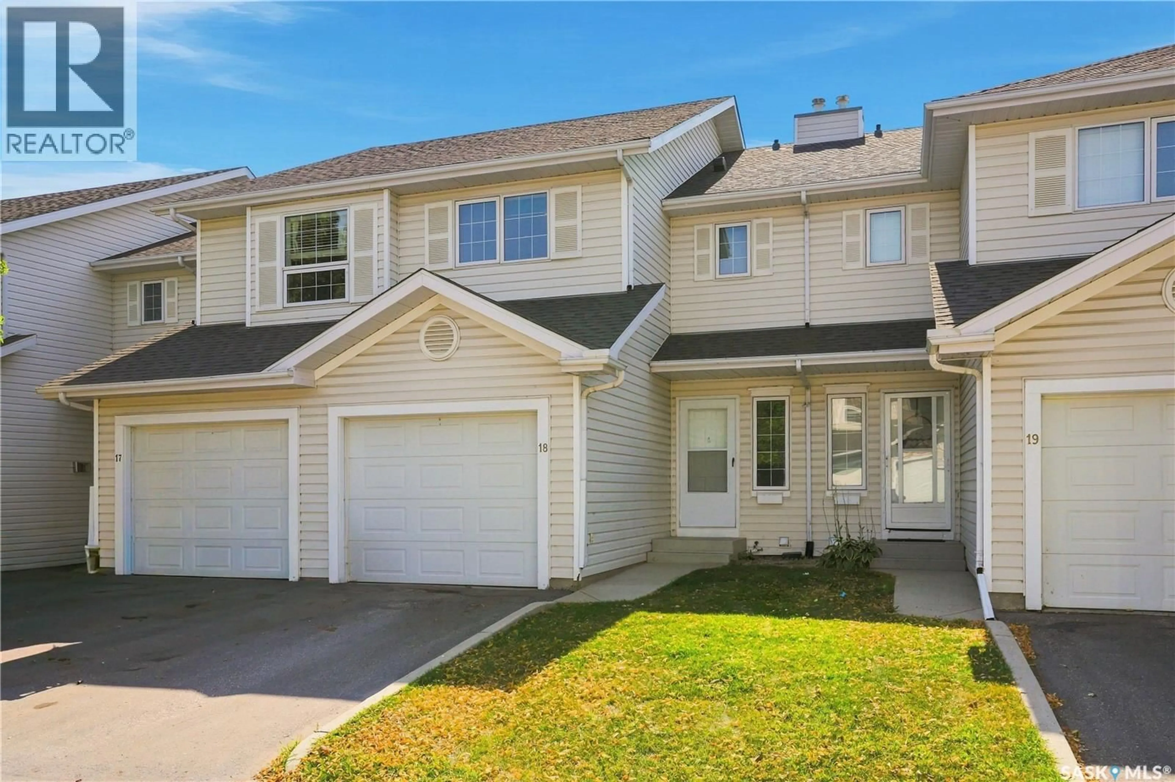 Home with vinyl exterior material, street for 18 110 KEEVIL CRESCENT, Saskatoon Saskatchewan S7N4N8