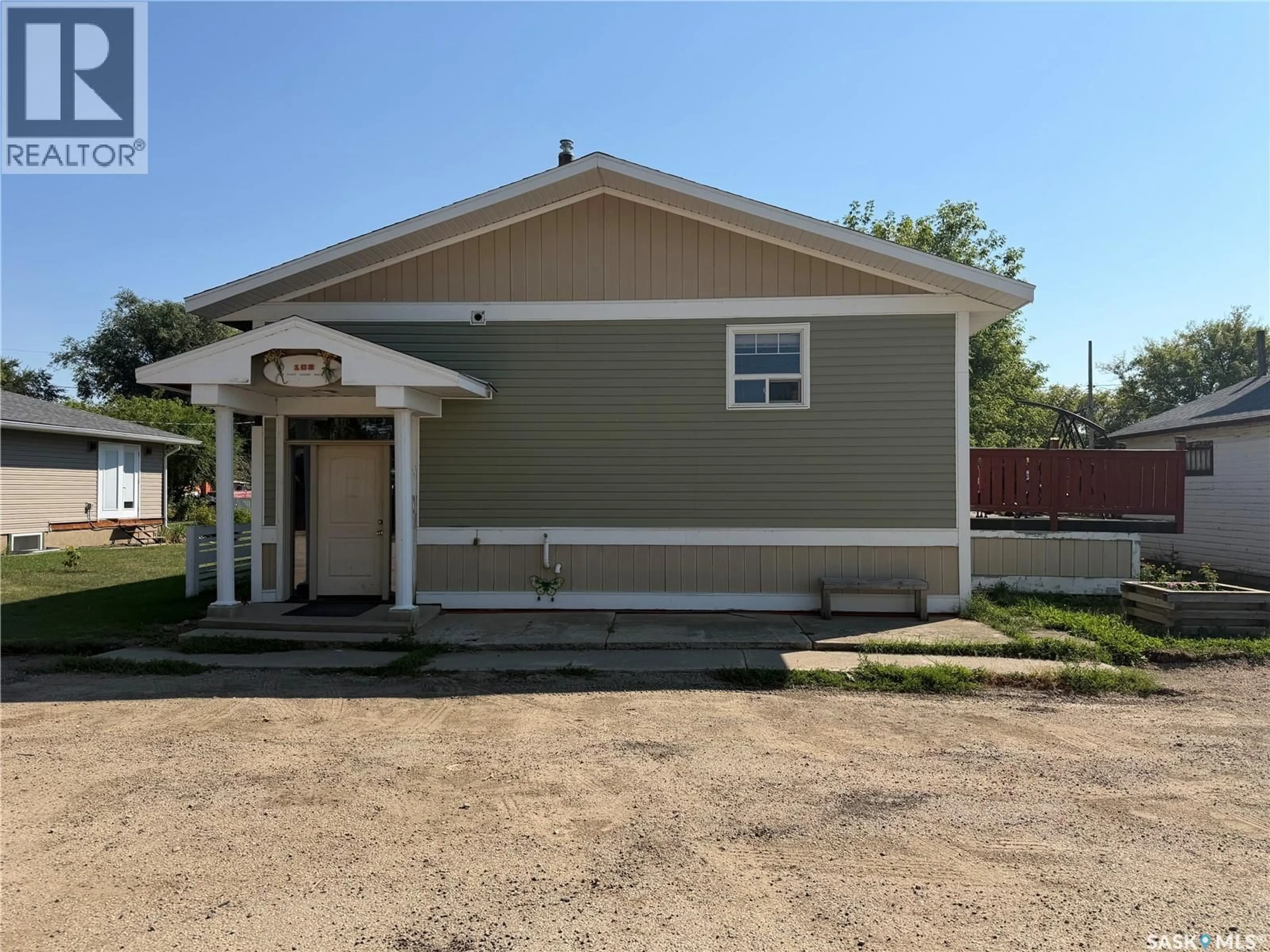 Home with vinyl exterior material, street for 102 1ST AVENUE, Marcelin Saskatchewan S0J1R0