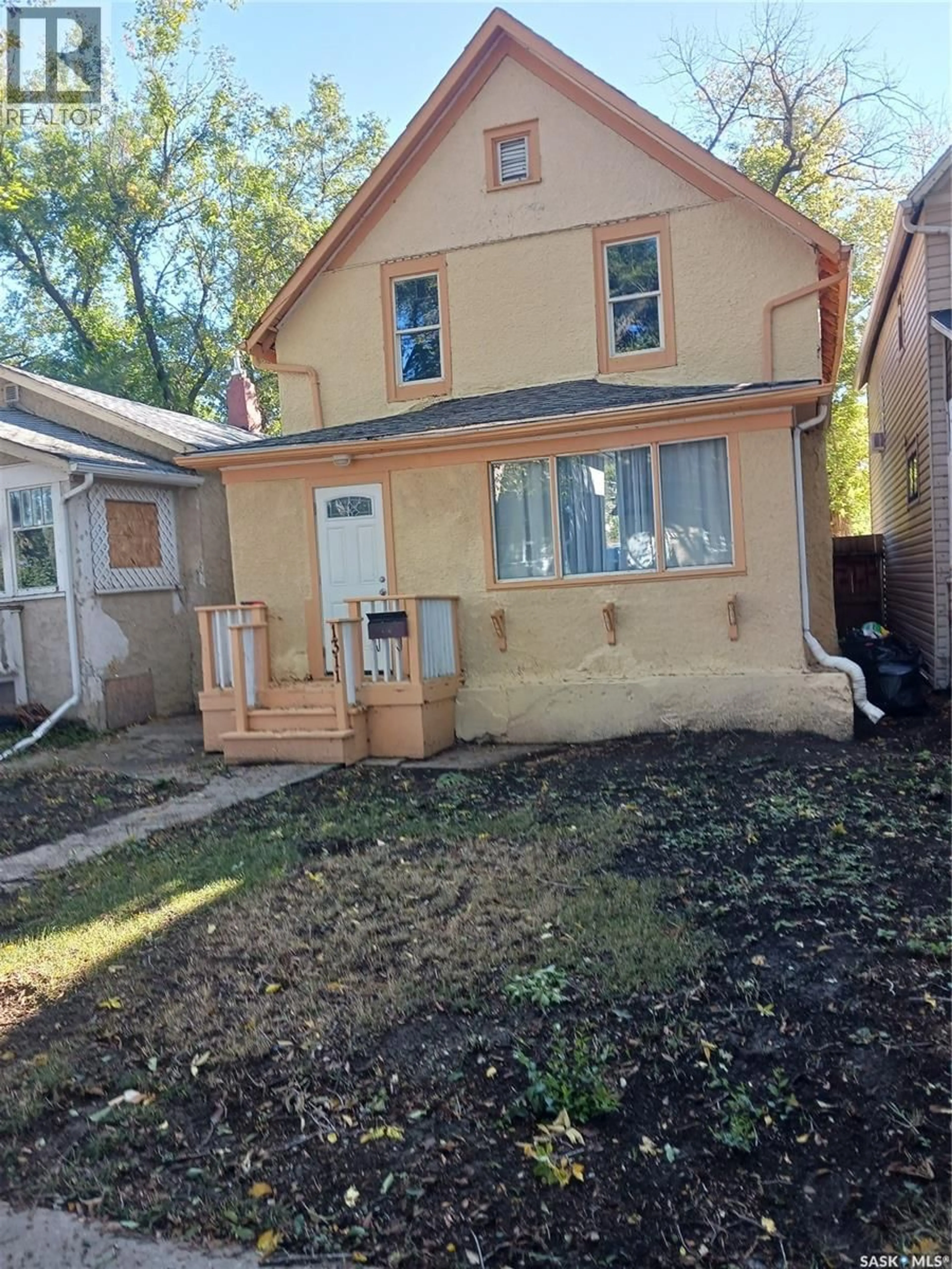 Home with vinyl exterior material, street for 1311 RETALLACK STREET, Regina Saskatchewan S4T2J1
