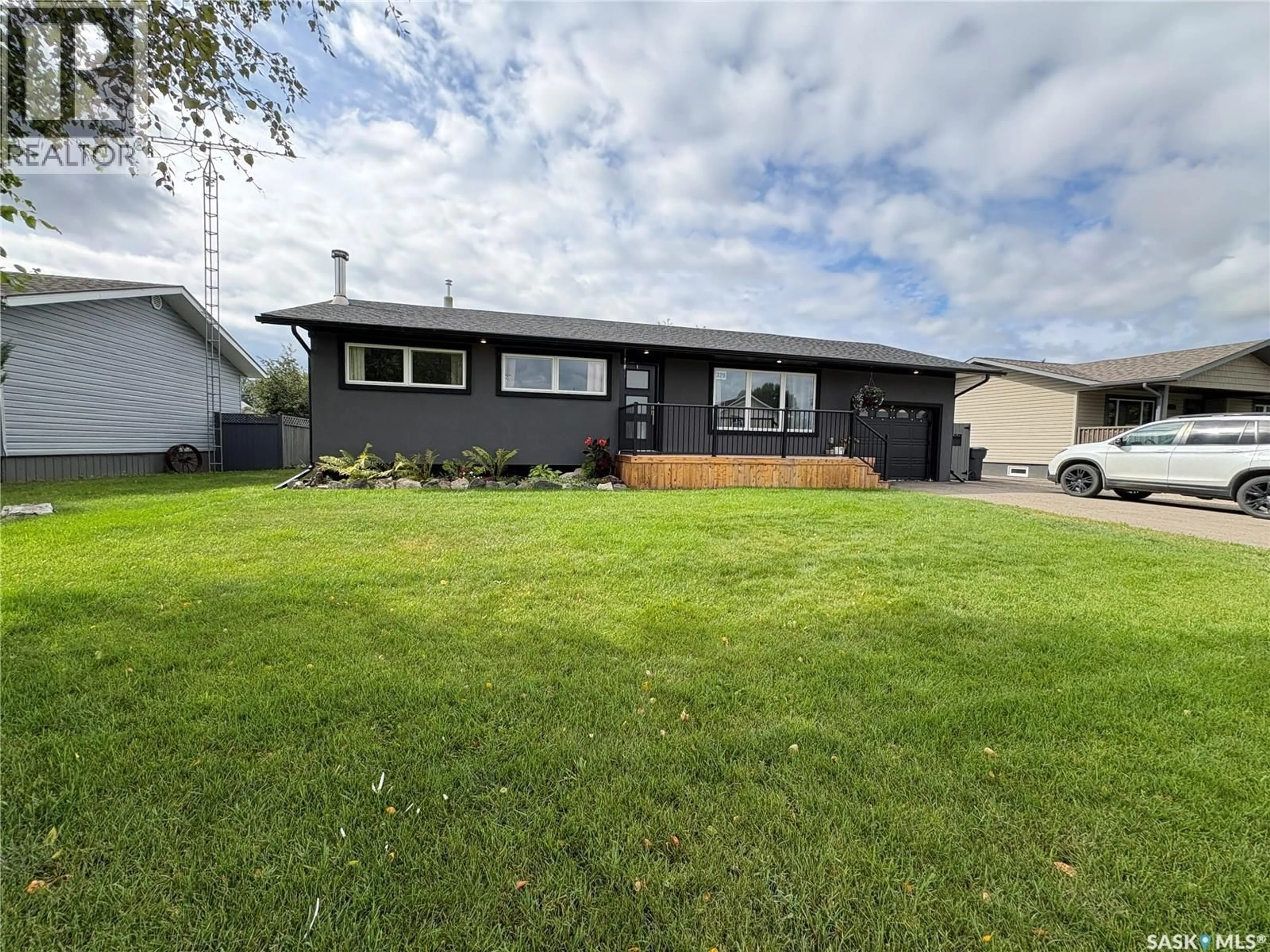 Home with vinyl exterior material, street for 329 PROTHERO AVENUE, Churchbridge Saskatchewan S0A0M0