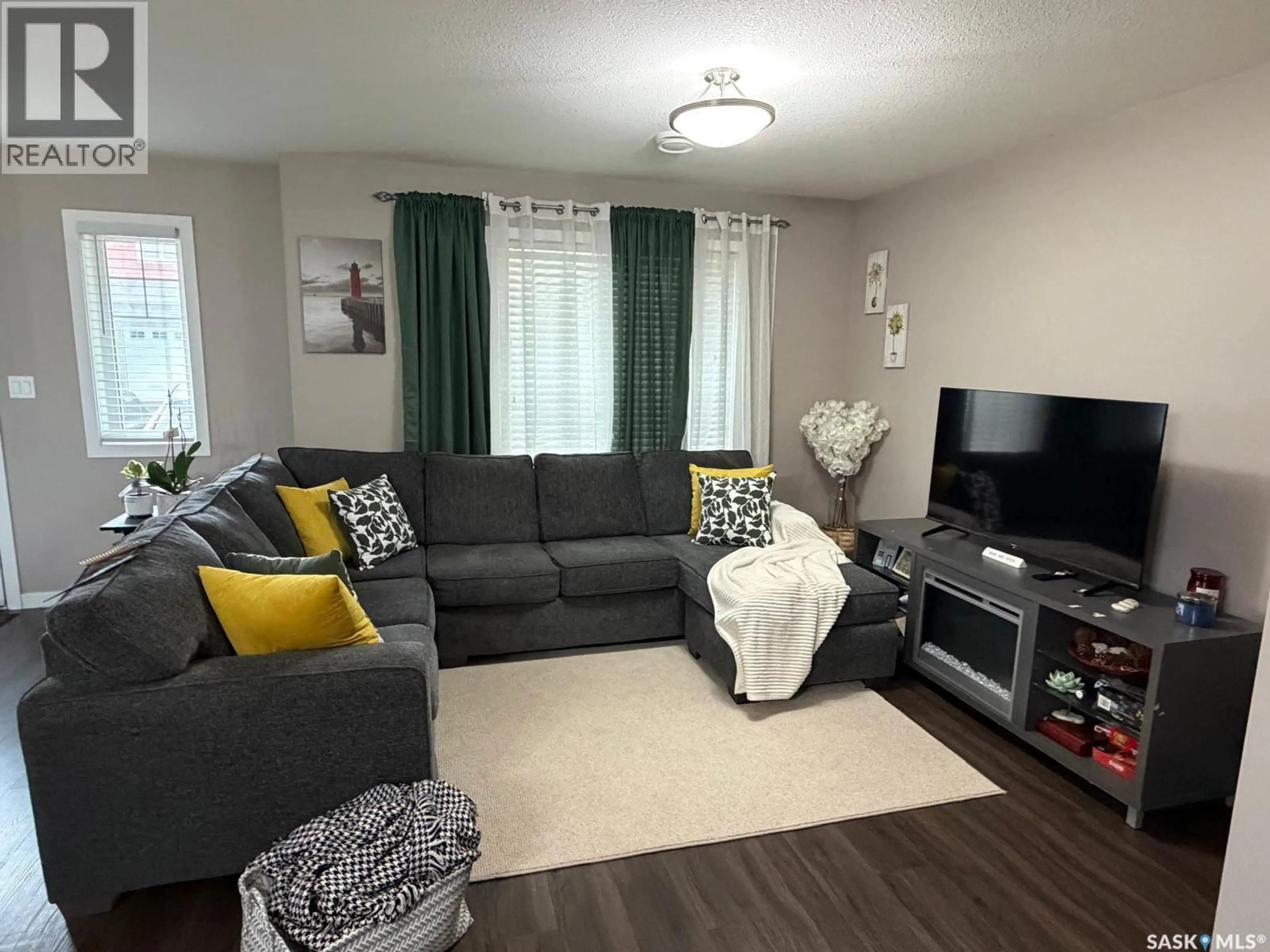 Living room with furniture, unknown for 3440 - 503 AVONHURST DRIVE, Regina Saskatchewan S4R2E1