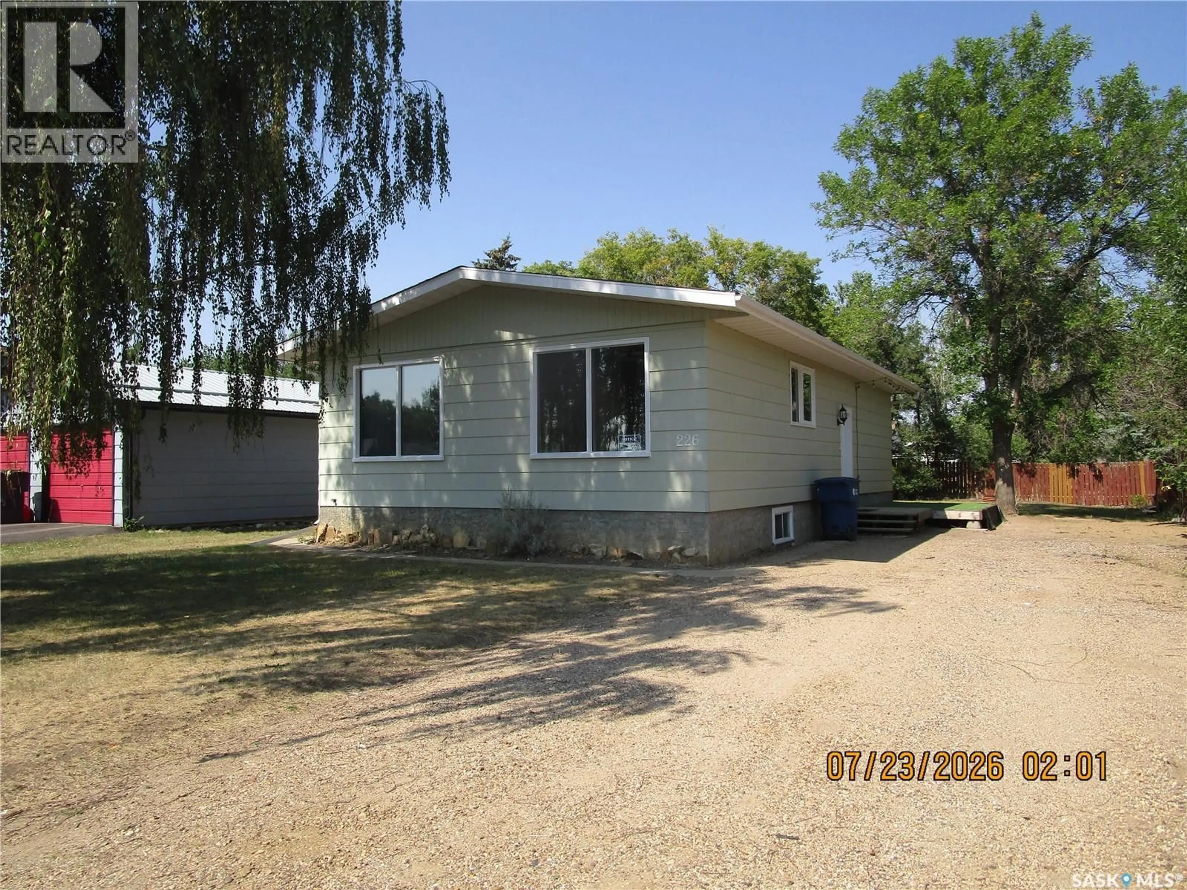 Home with vinyl exterior material, street for 226 WESTVIEW DRIVE, Coronach Saskatchewan S0H0Z0