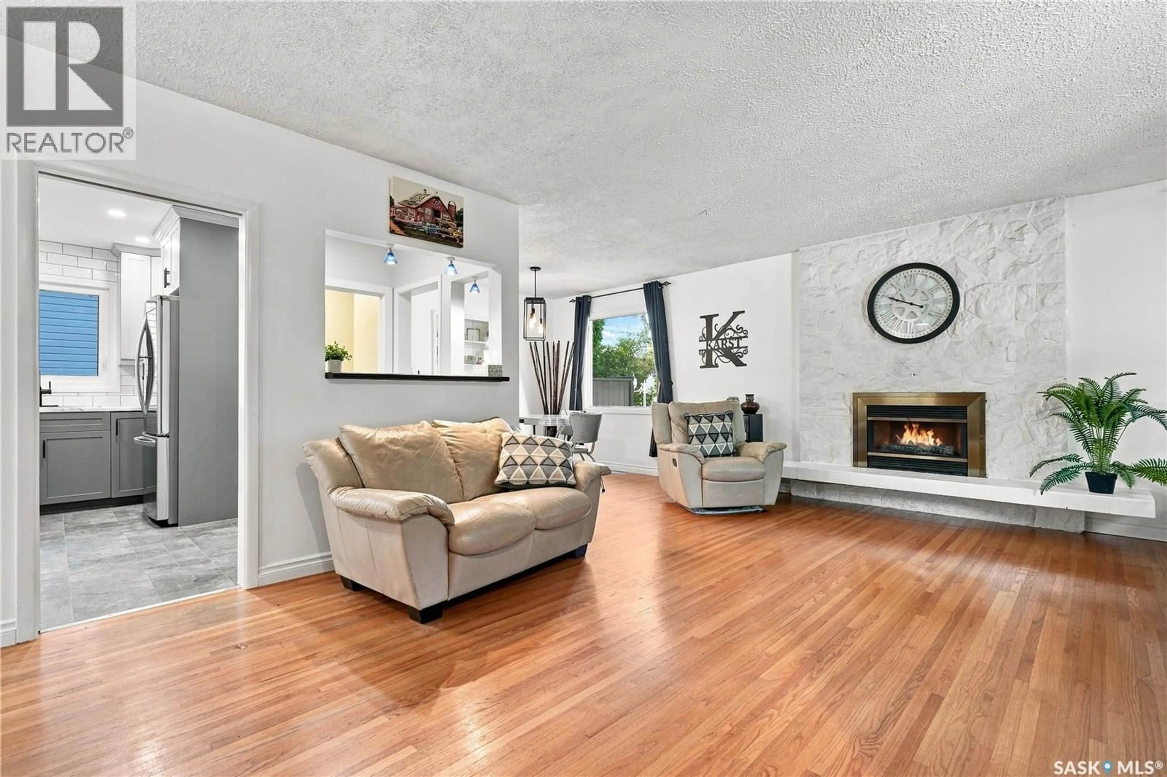 Living room with furniture, unknown for 74 MCASKILL CRESCENT, Saskatoon Saskatchewan S7J2P6