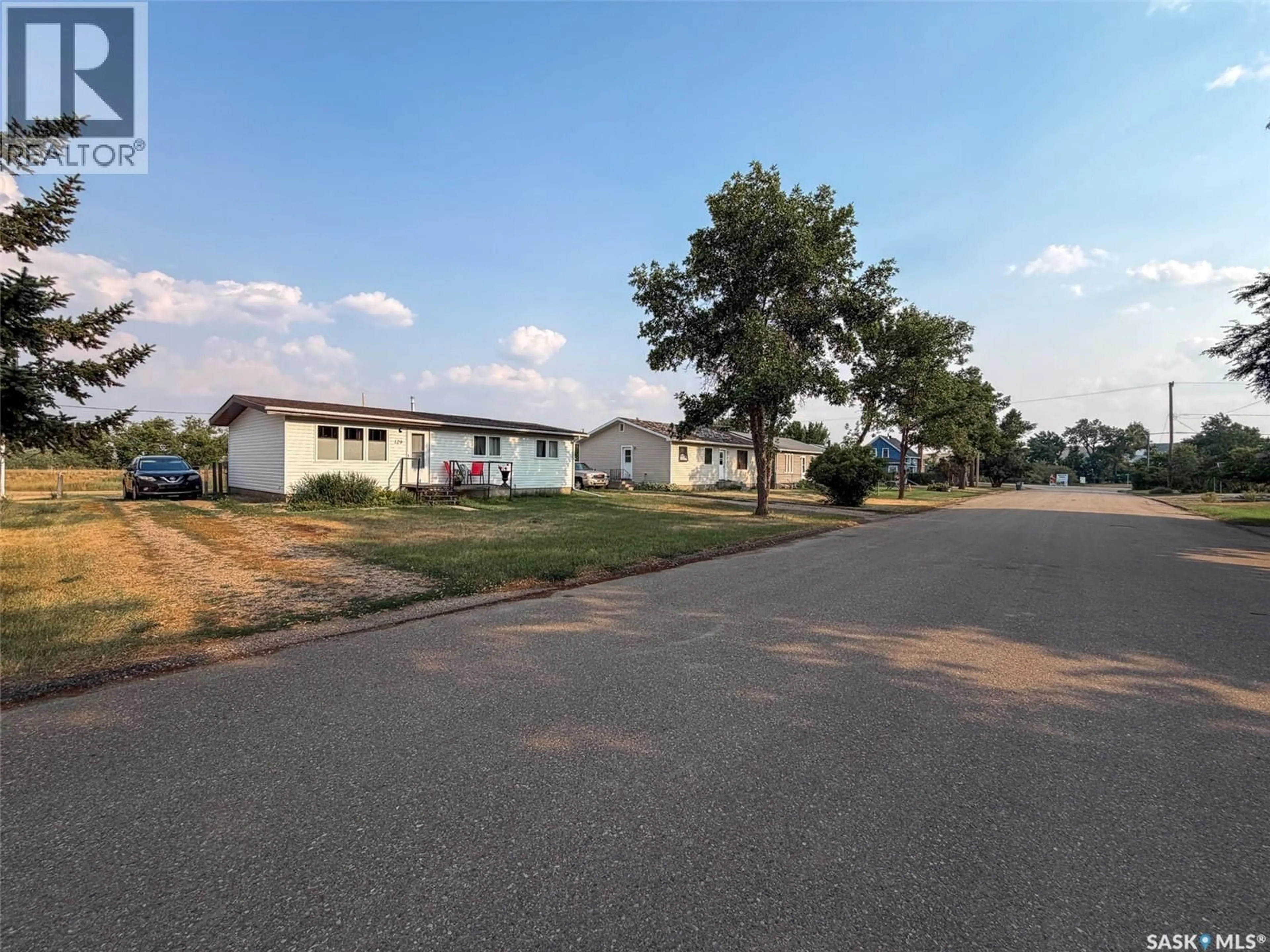 A pic from outside/outdoor area/front of a property/back of a property/a pic from drone, street for 129 ASH AVENUE, Eastend Saskatchewan S0N0T0