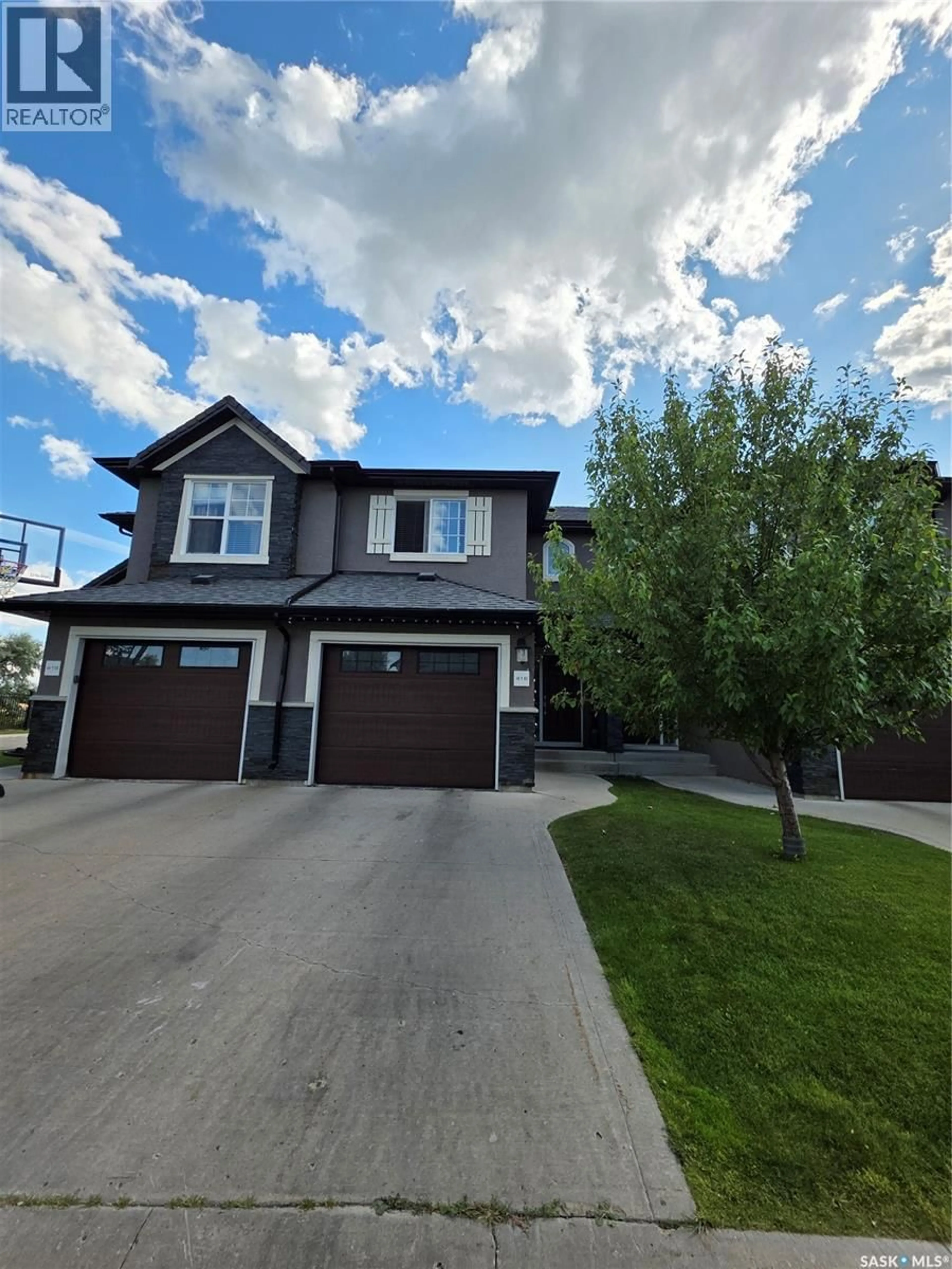 Home with vinyl exterior material, street for 416 - 1303 PATON CRESCENT, Saskatoon Saskatchewan S7W0P7