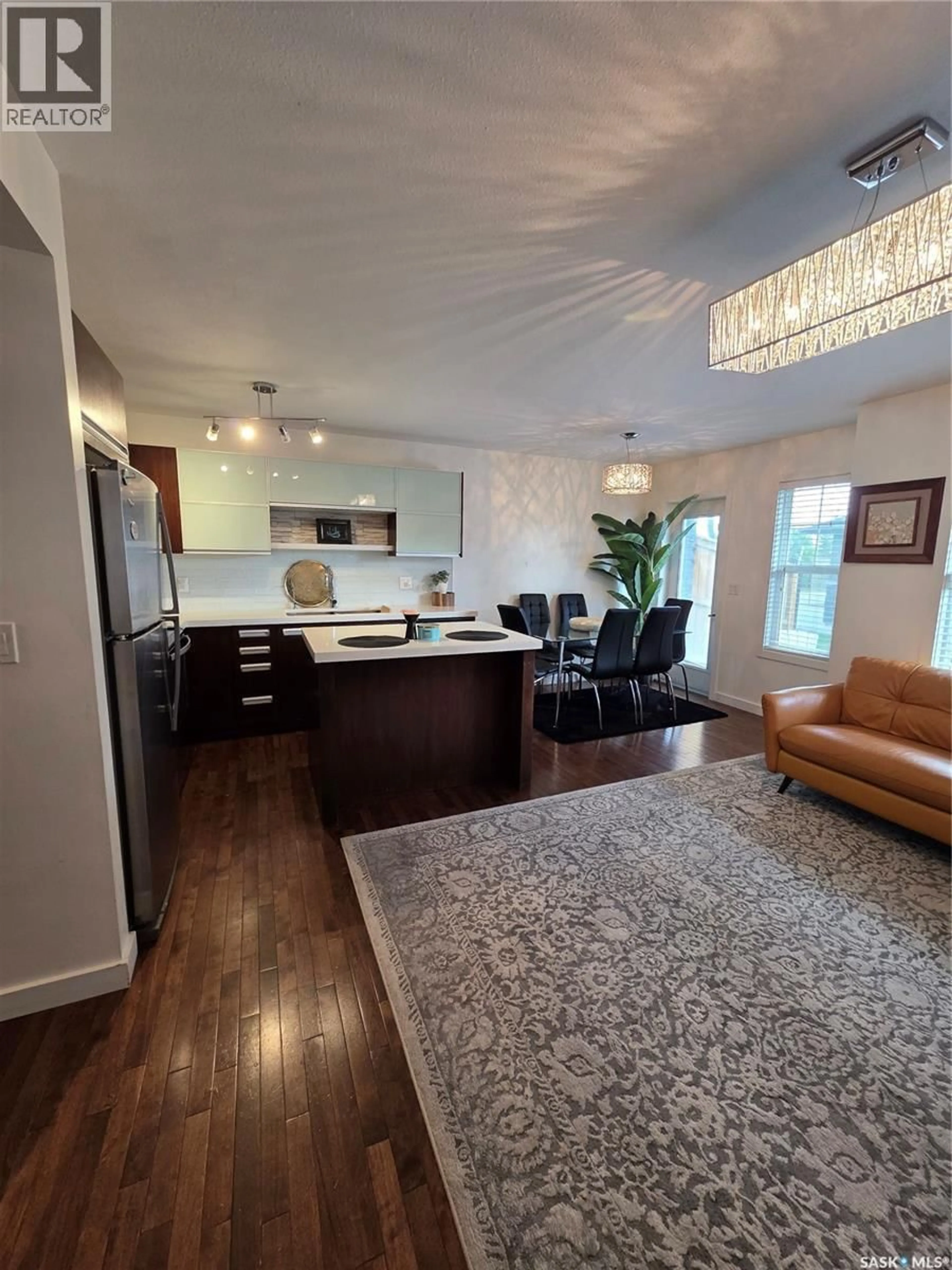 Open concept kitchen, wood/laminate floor for 416 - 1303 PATON CRESCENT, Saskatoon Saskatchewan S7W0P7