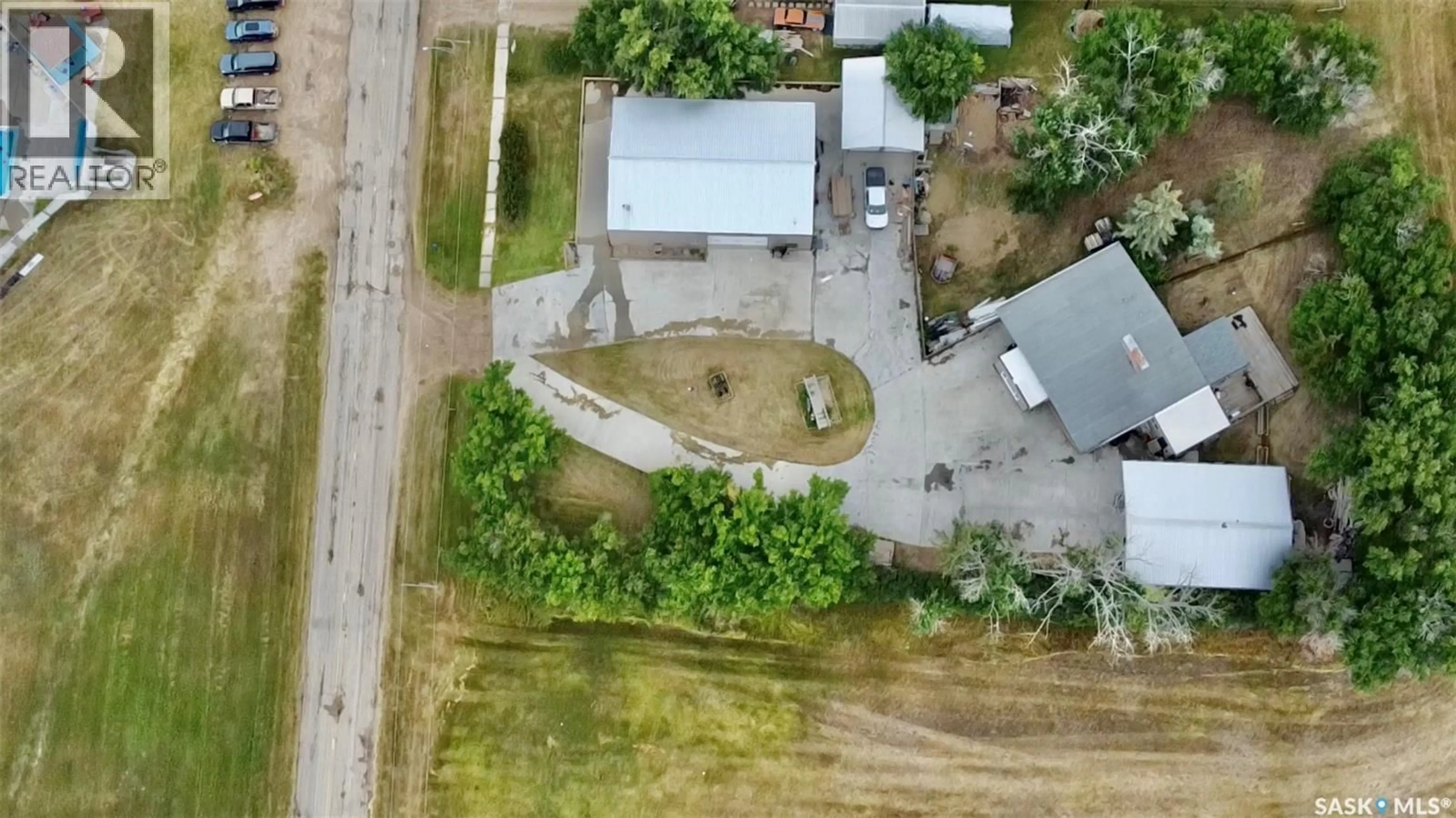 A pic from outside/outdoor area/front of a property/back of a property/a pic from drone, street for CHAPLIN ACREAGE, Chaplin Saskatchewan S0H0V0