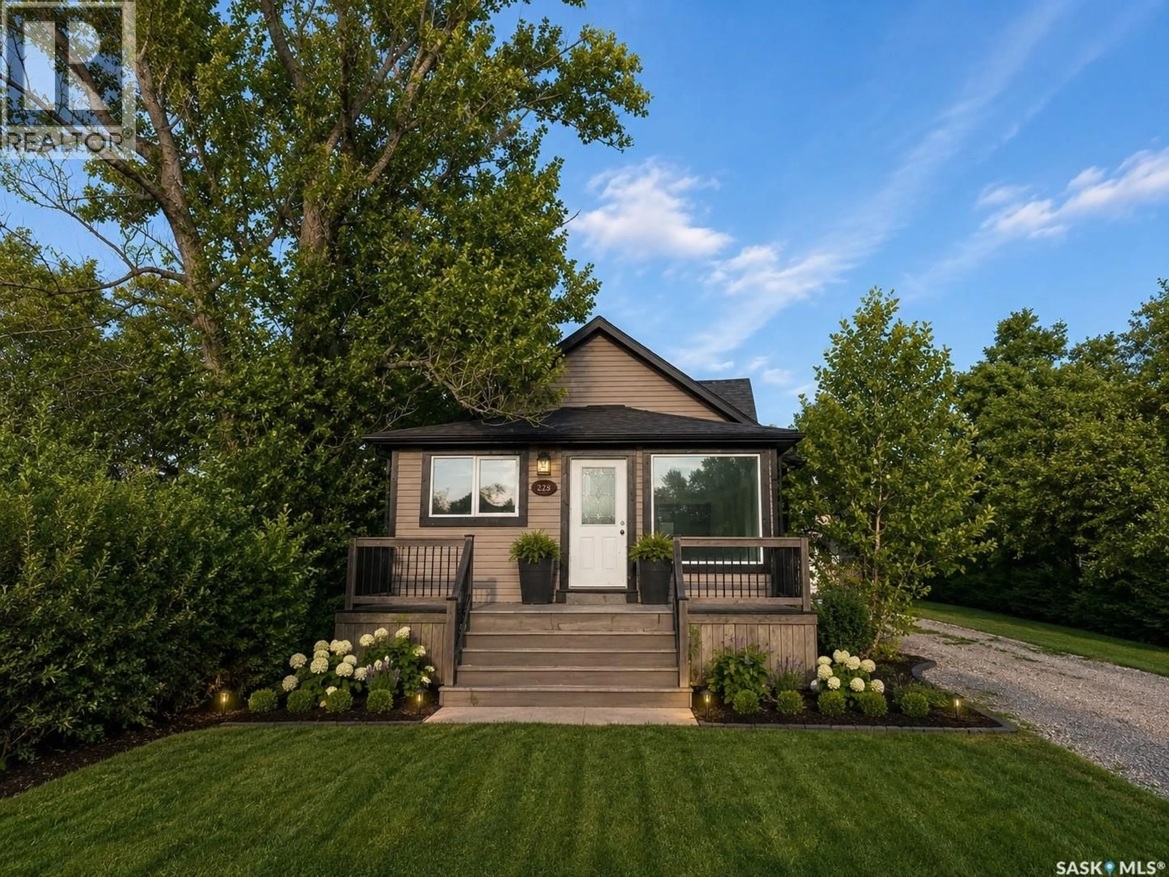 Home with vinyl exterior material, street for 222 1ST STREET, Lang Saskatchewan S0G2W0