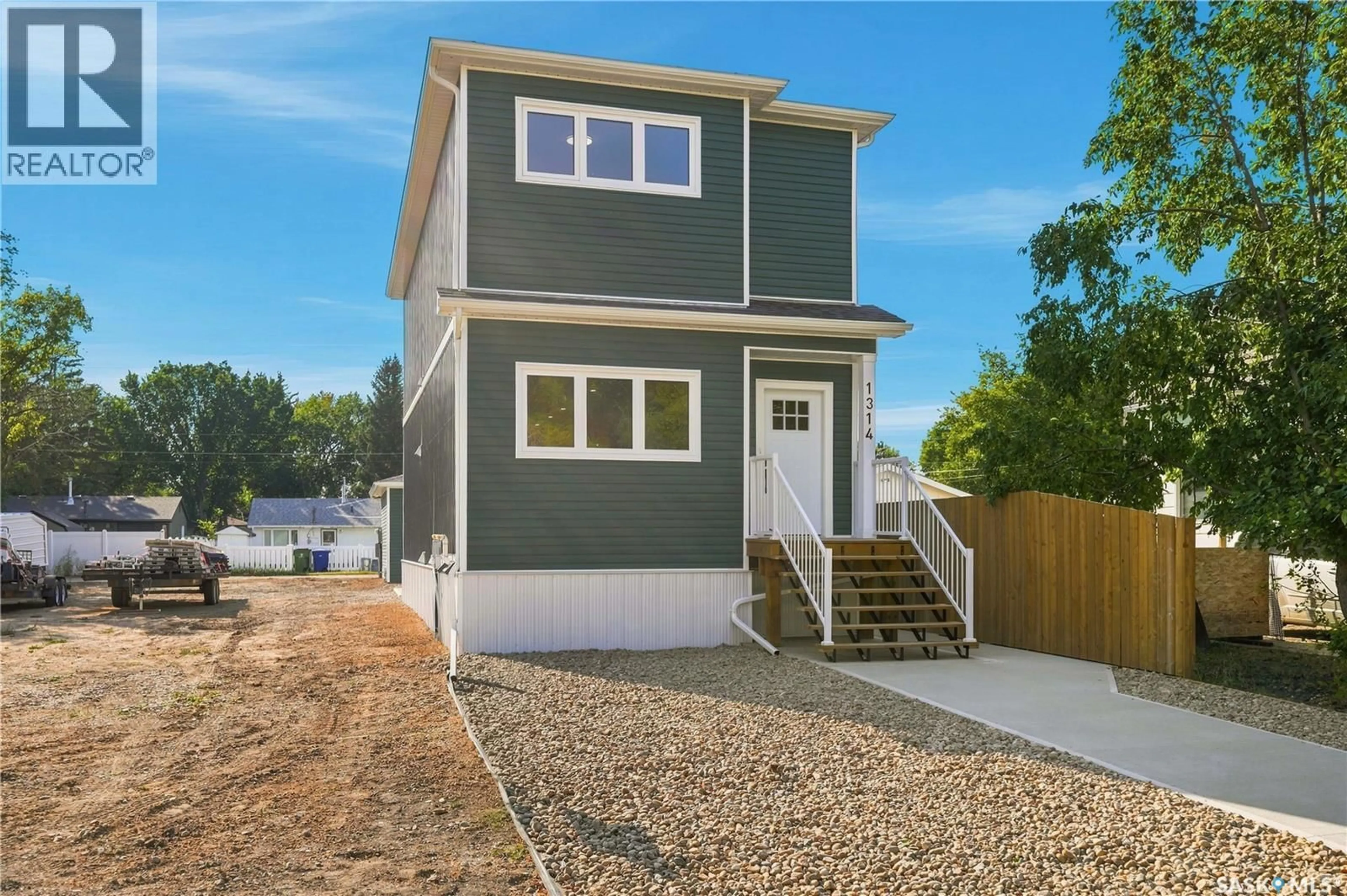 Home with vinyl exterior material, street for 1314 CONNAUGHT AVENUE, Moose Jaw Saskatchewan S6H7H6