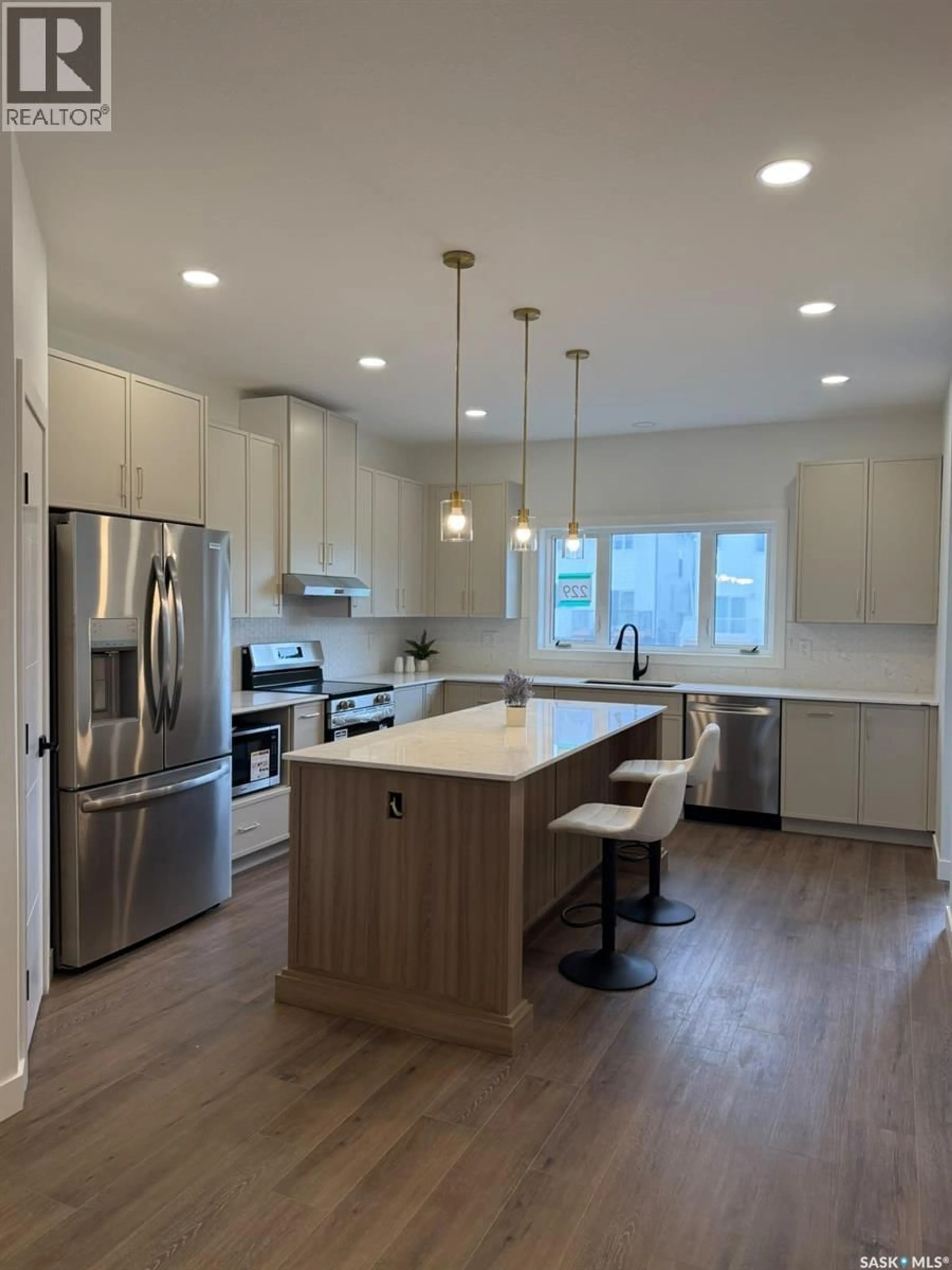 Open concept kitchen, unknown for 225 ASPEN RIDGE STREET, Saskatoon Saskatchewan S7W1N1