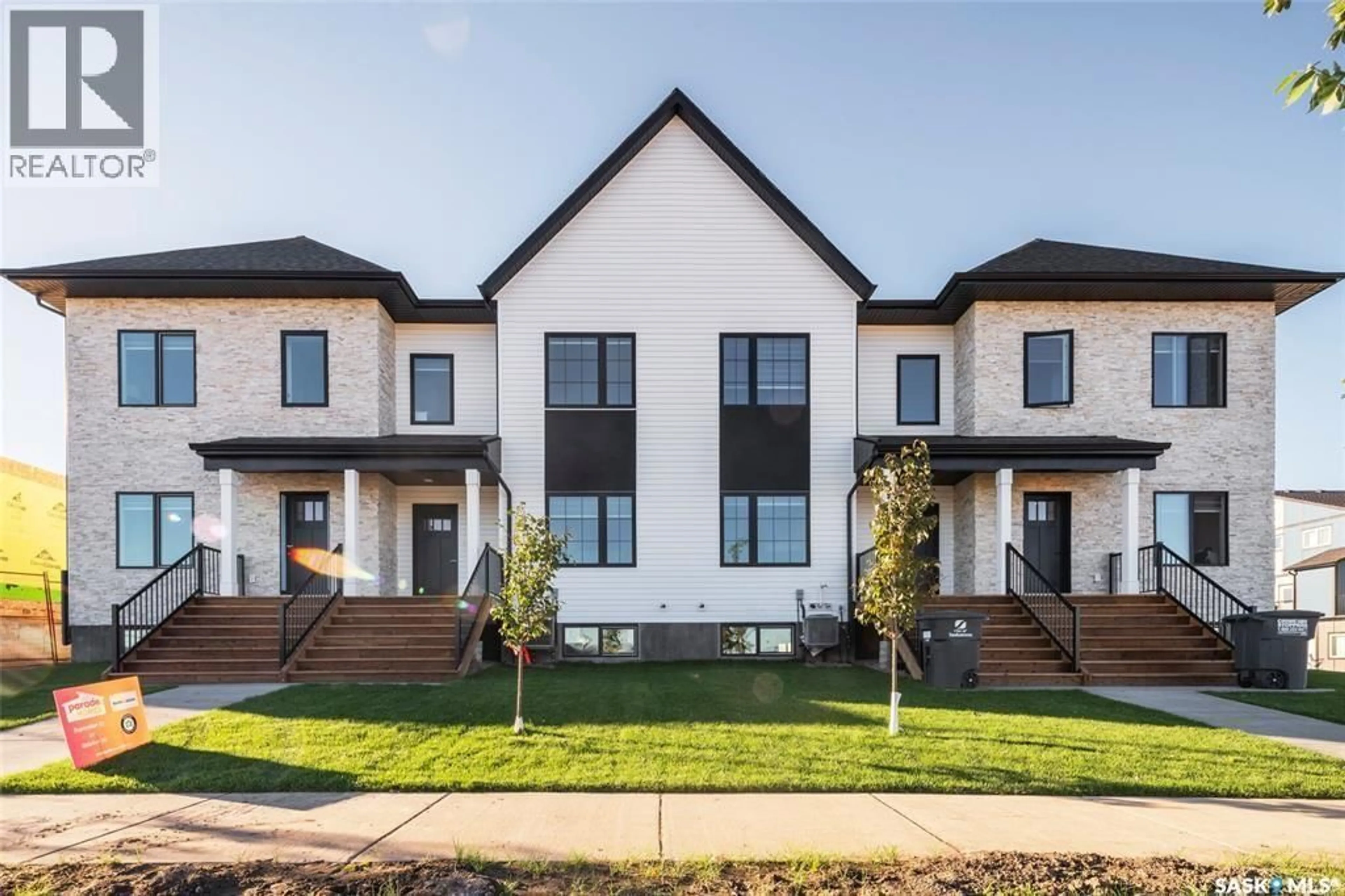 Home with brick exterior material, street for 223 FEHEREGYHAZI BOULEVARD, Saskatoon Saskatchewan S7W0C2