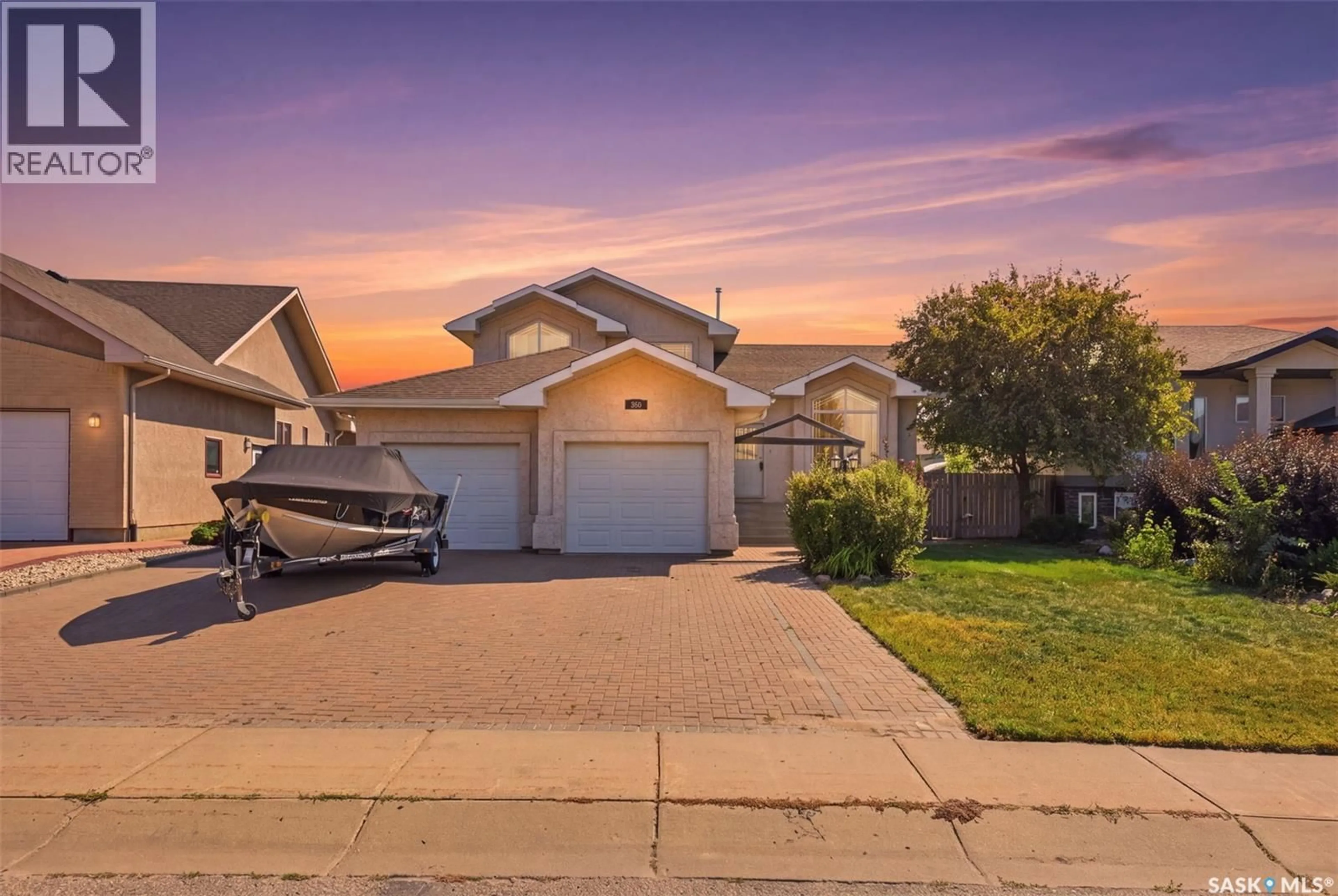 A pic from outside/outdoor area/front of a property/back of a property/a pic from drone, street for 506 CRYSTAL SPRINGS DRIVE, Warman Saskatchewan S0K0A1