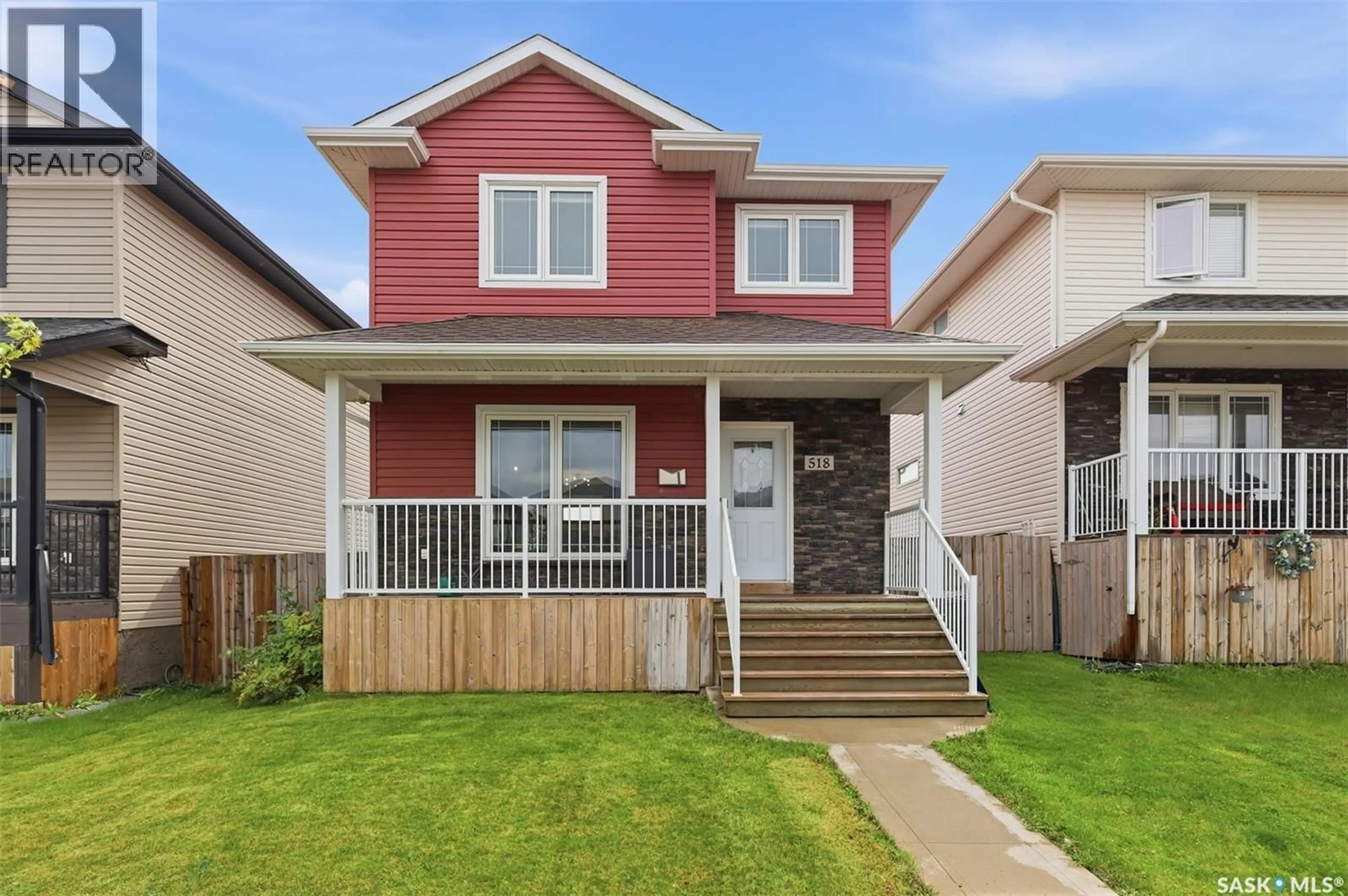 Home with vinyl exterior material, street for 518 KLASSEN CRESCENT, Saskatoon Saskatchewan S7R0G2