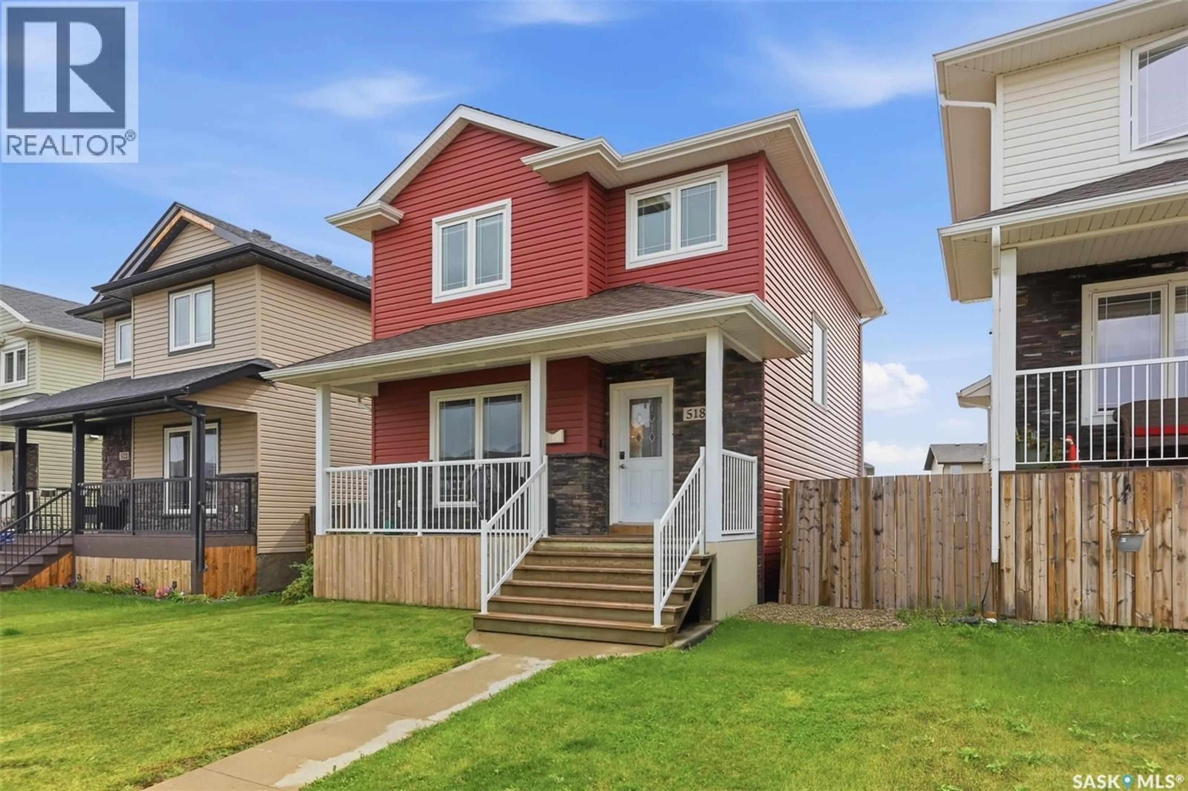 Home with vinyl exterior material, street for 518 KLASSEN CRESCENT, Saskatoon Saskatchewan S7R0G2
