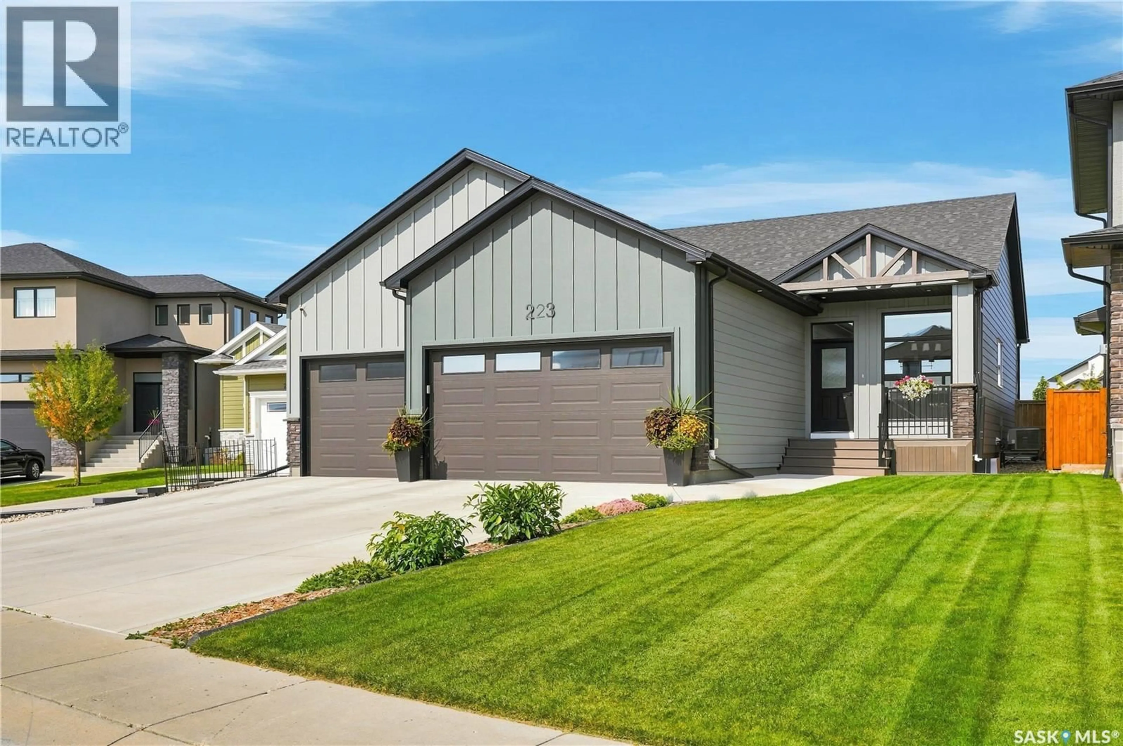 Home with vinyl exterior material, street for 223 HAMM CRESCENT, Saskatoon Saskatchewan S7V0R9