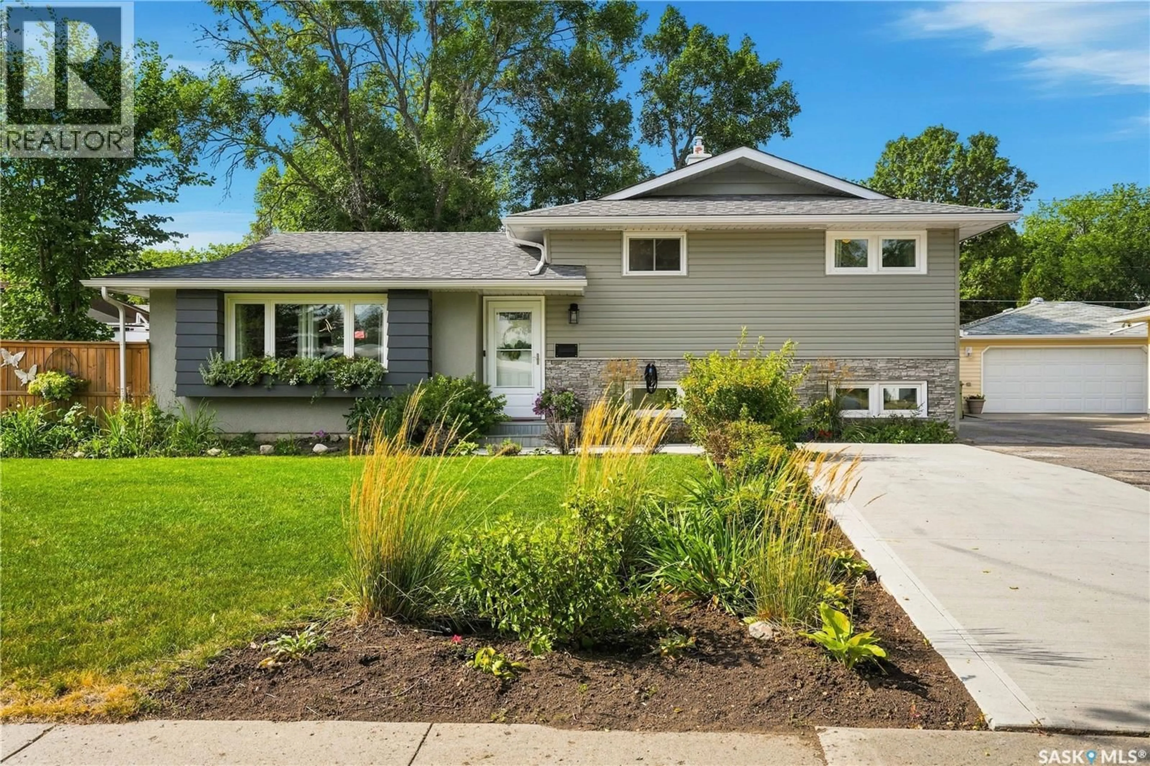 Home with vinyl exterior material, street for 2524 GRANT ROAD, Regina Saskatchewan S4S5E6