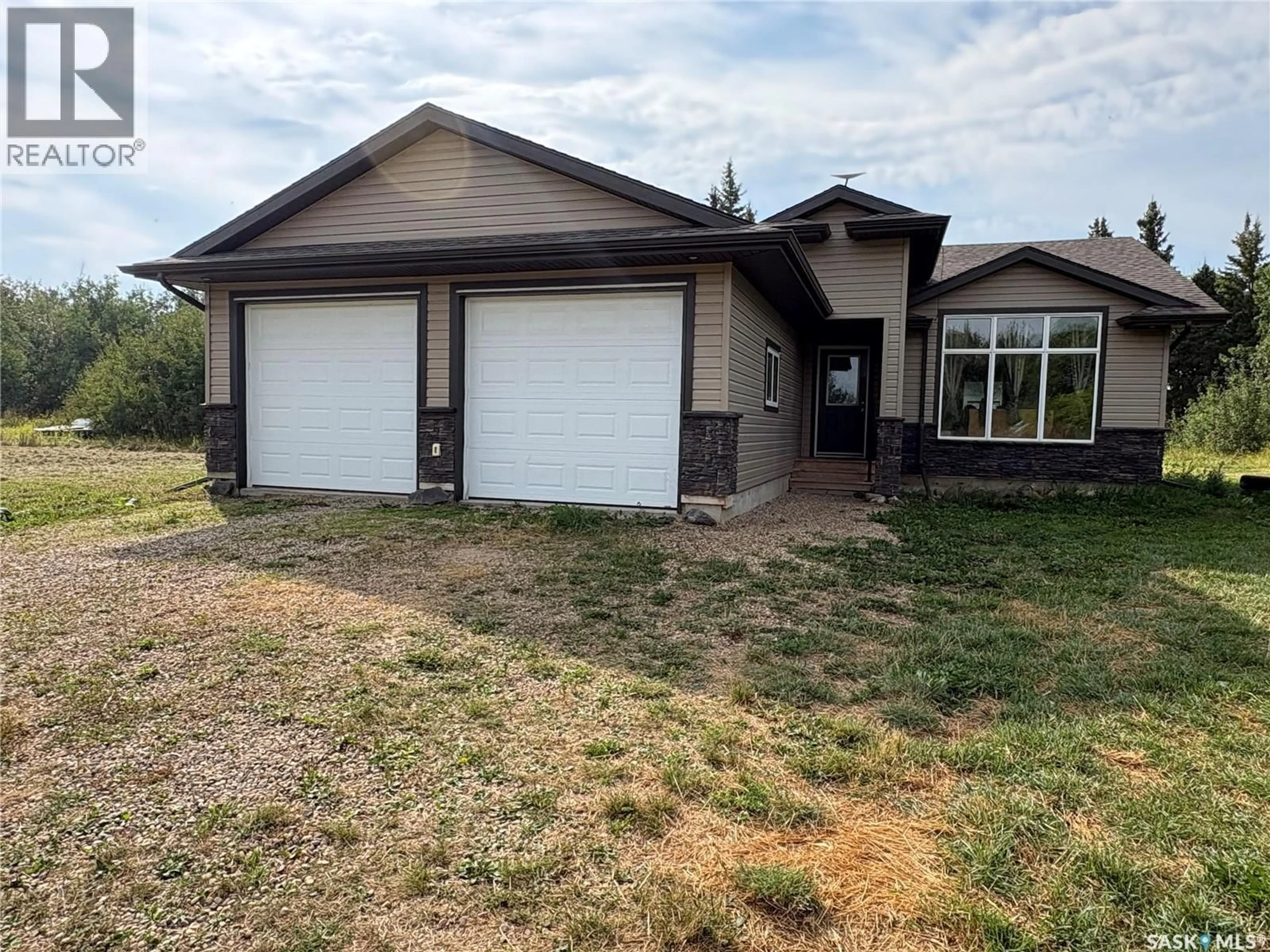 Home with vinyl exterior material, street for Rm OF LIVINGSTONE ACREAGE, Livingston Rm No. 331 Saskatchewan S0A0B0