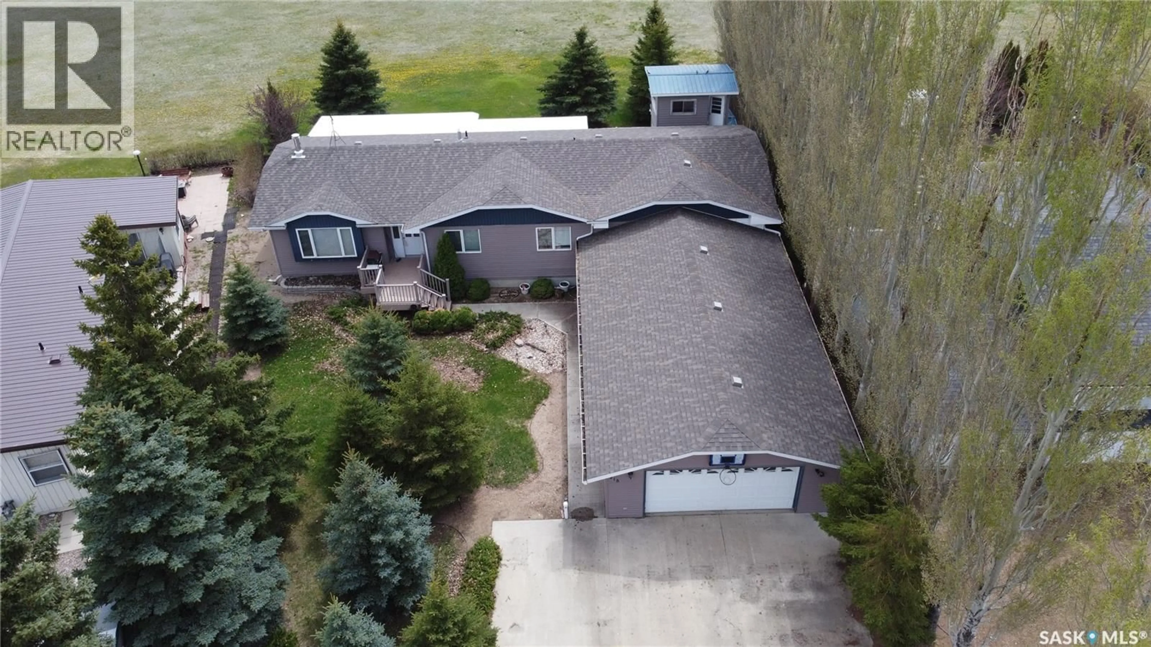 A pic from outside/outdoor area/front of a property/back of a property/a pic from drone, building for 218 RUBY DRIVE, Coteau Rm No. 255 Saskatchewan S0L0G0