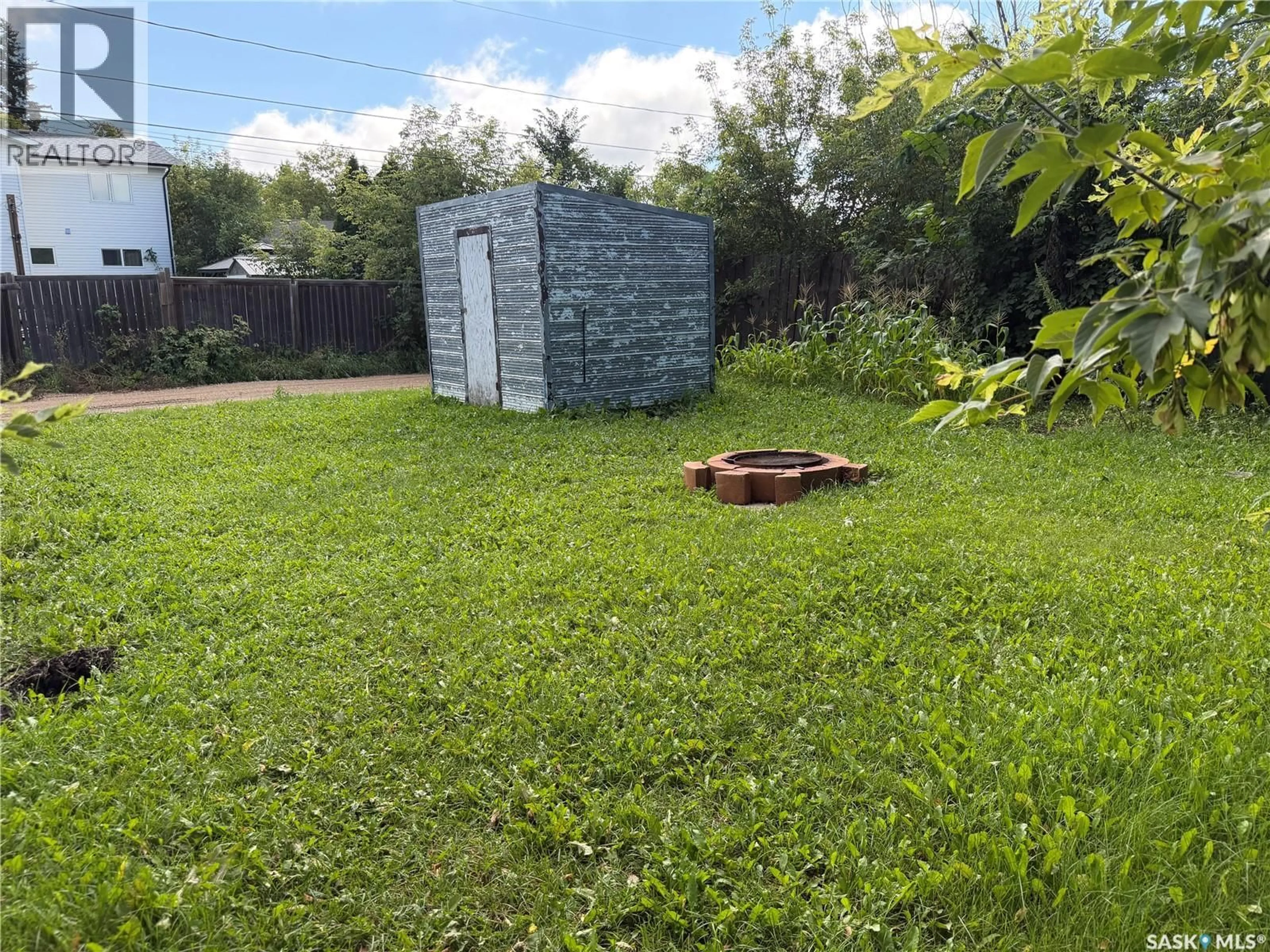 A pic from outside/outdoor area/front of a property/back of a property/a pic from drone, building for 104 4TH AVENUE, Melfort Saskatchewan S0E1A0