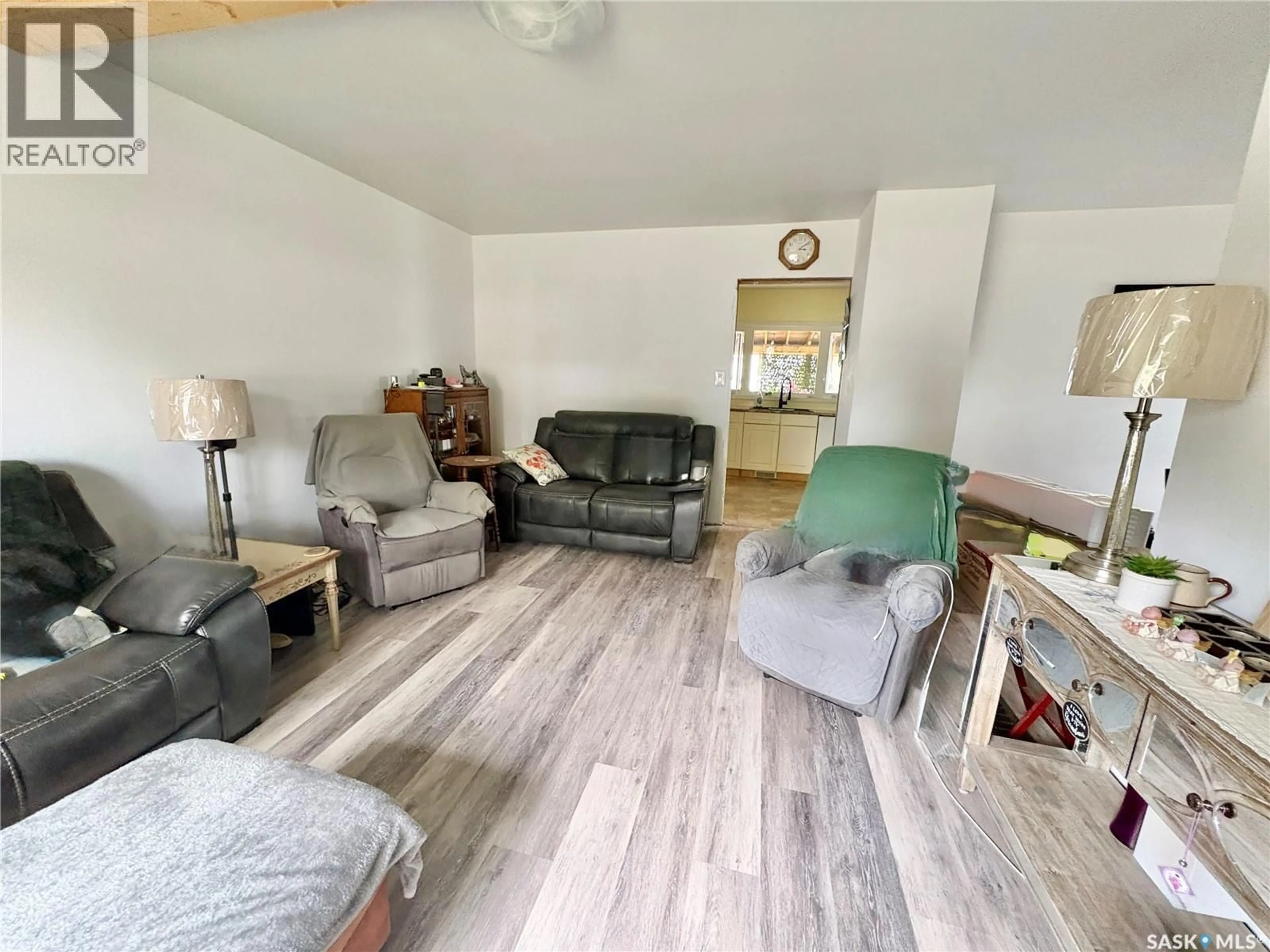 Living room with furniture, unknown for 49 14TH AVENUE, Swift Current Saskatchewan S9H3S3