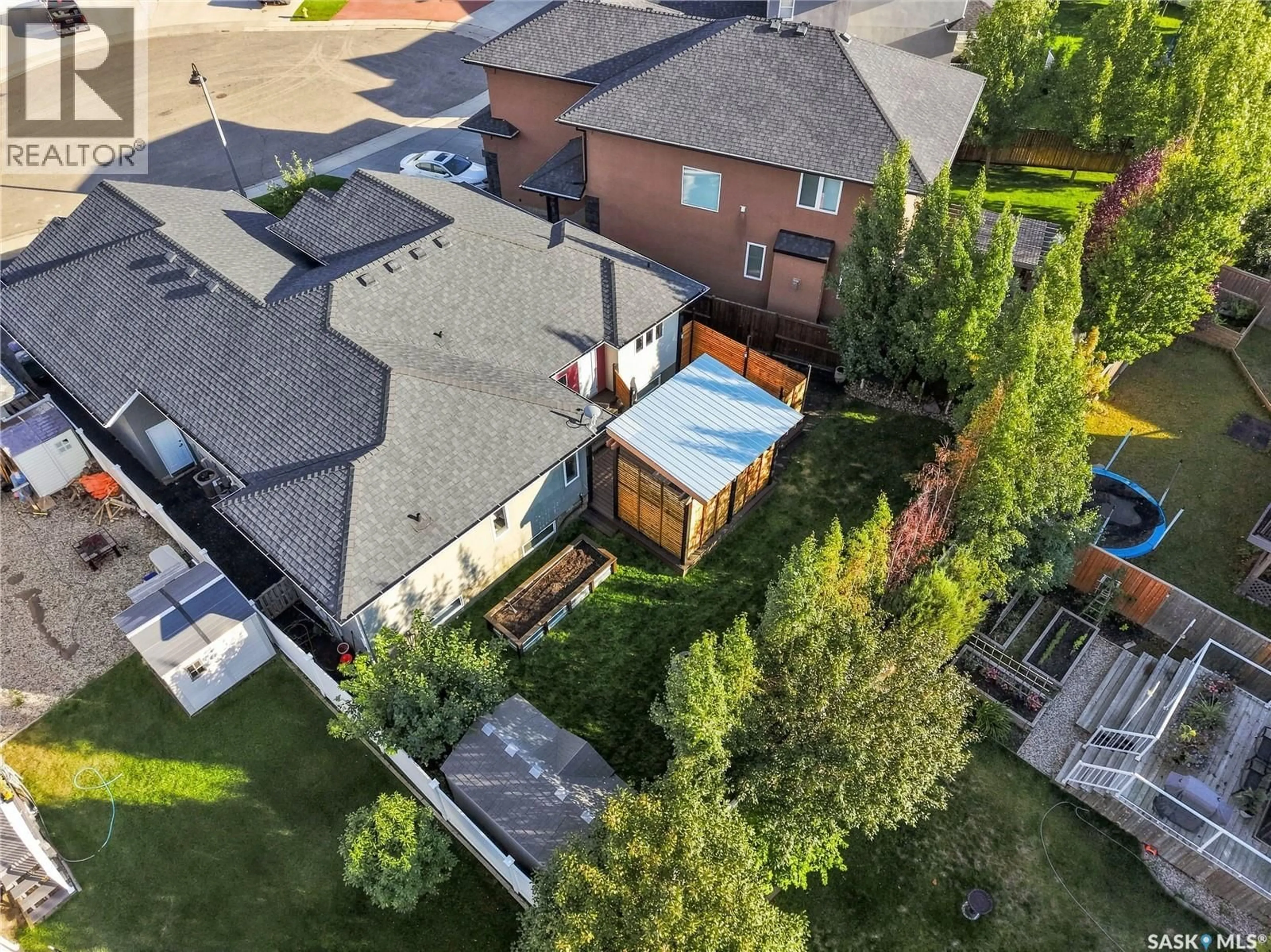 A pic from outside/outdoor area/front of a property/back of a property/a pic from drone, street for 243 TEAL TERRACE, Saskatoon Saskatchewan S7T0P9