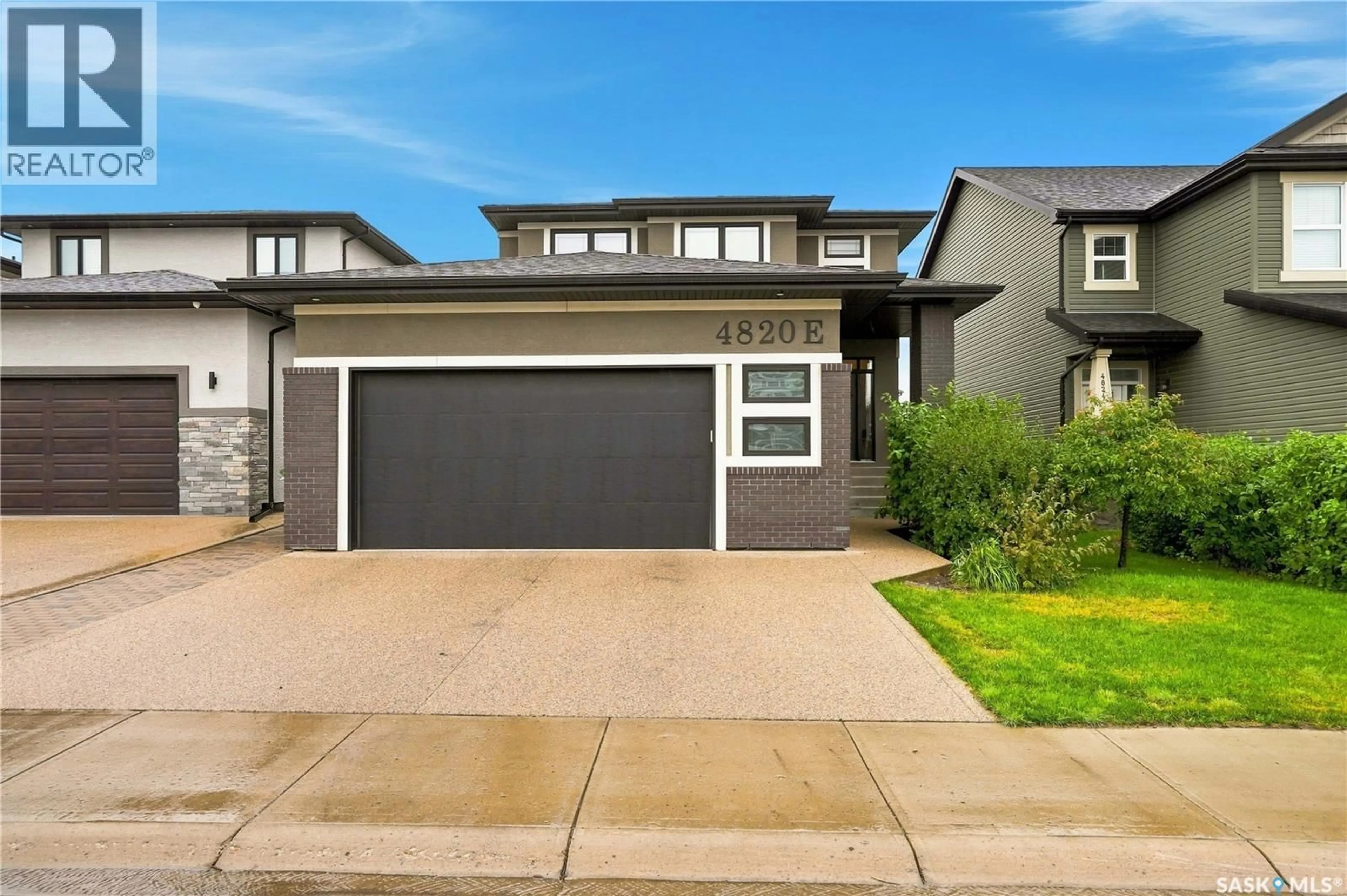 Home with vinyl exterior material, street for 4820 PRIMROSE GREEN DRIVE, Regina Saskatchewan S4V3S7