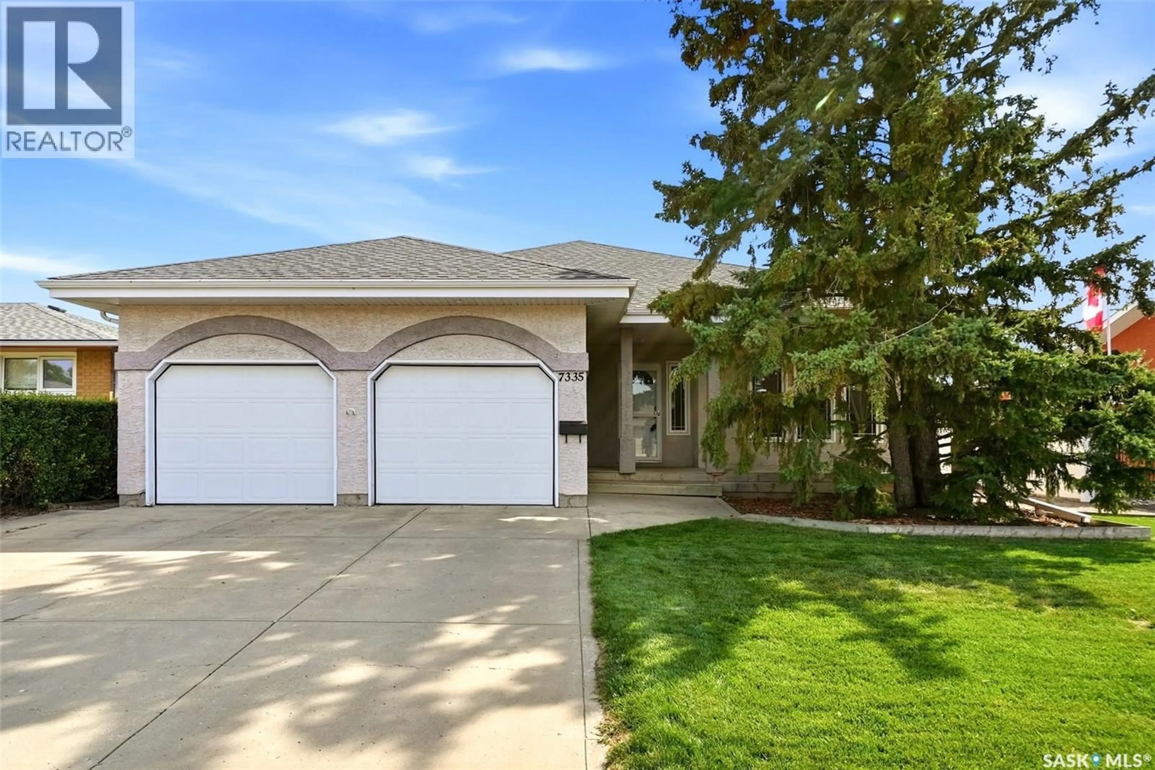 Home with vinyl exterior material, street for 7335 8TH AVENUE, Regina Saskatchewan S4T0X2