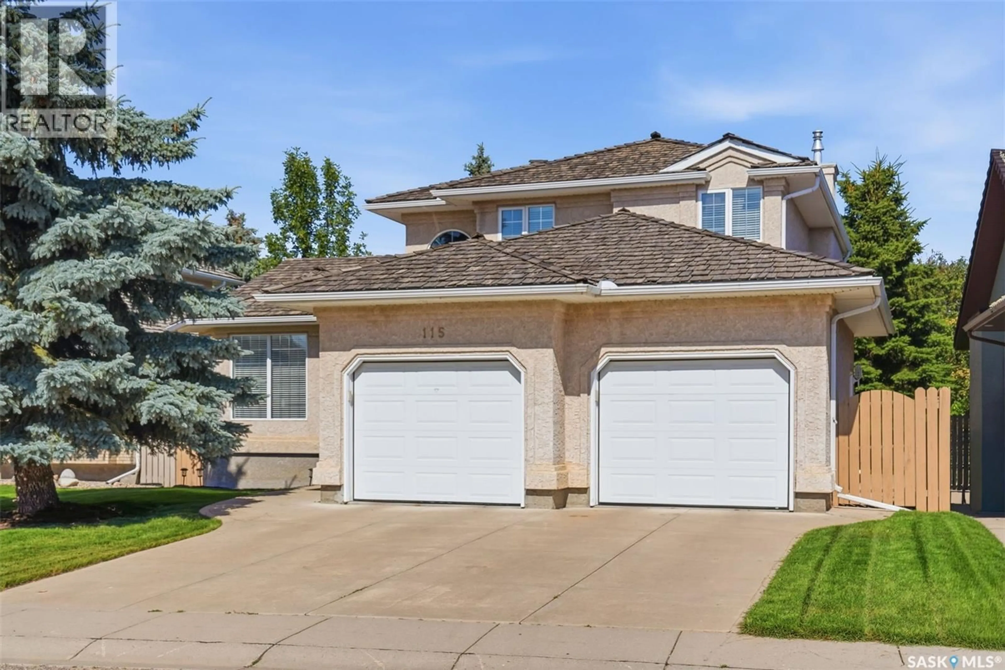 Home with vinyl exterior material, street for 115 BRAESHIRE LANE, Saskatoon Saskatchewan S7V1A1