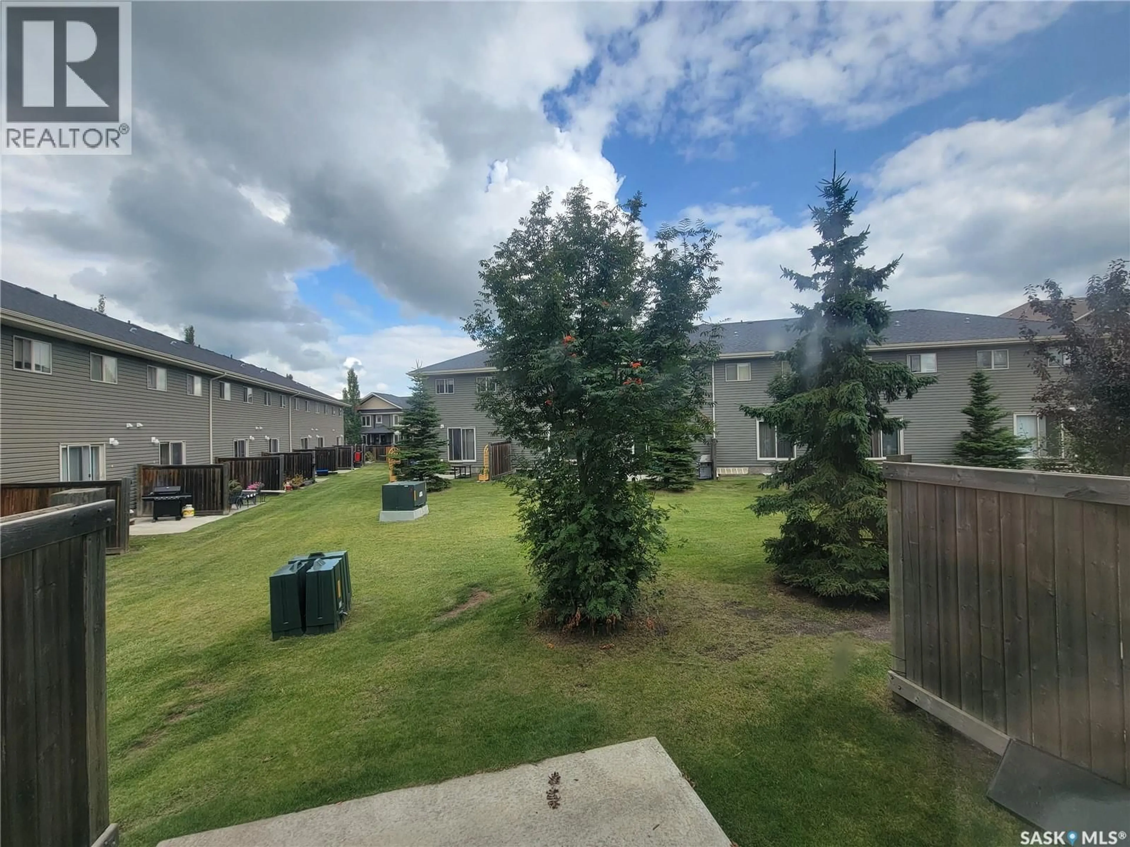 A pic from outside/outdoor area/front of a property/back of a property/a pic from drone, unknown for 53 - 1809 47 AVENUE, Lloydminster Saskatchewan S9V1W3