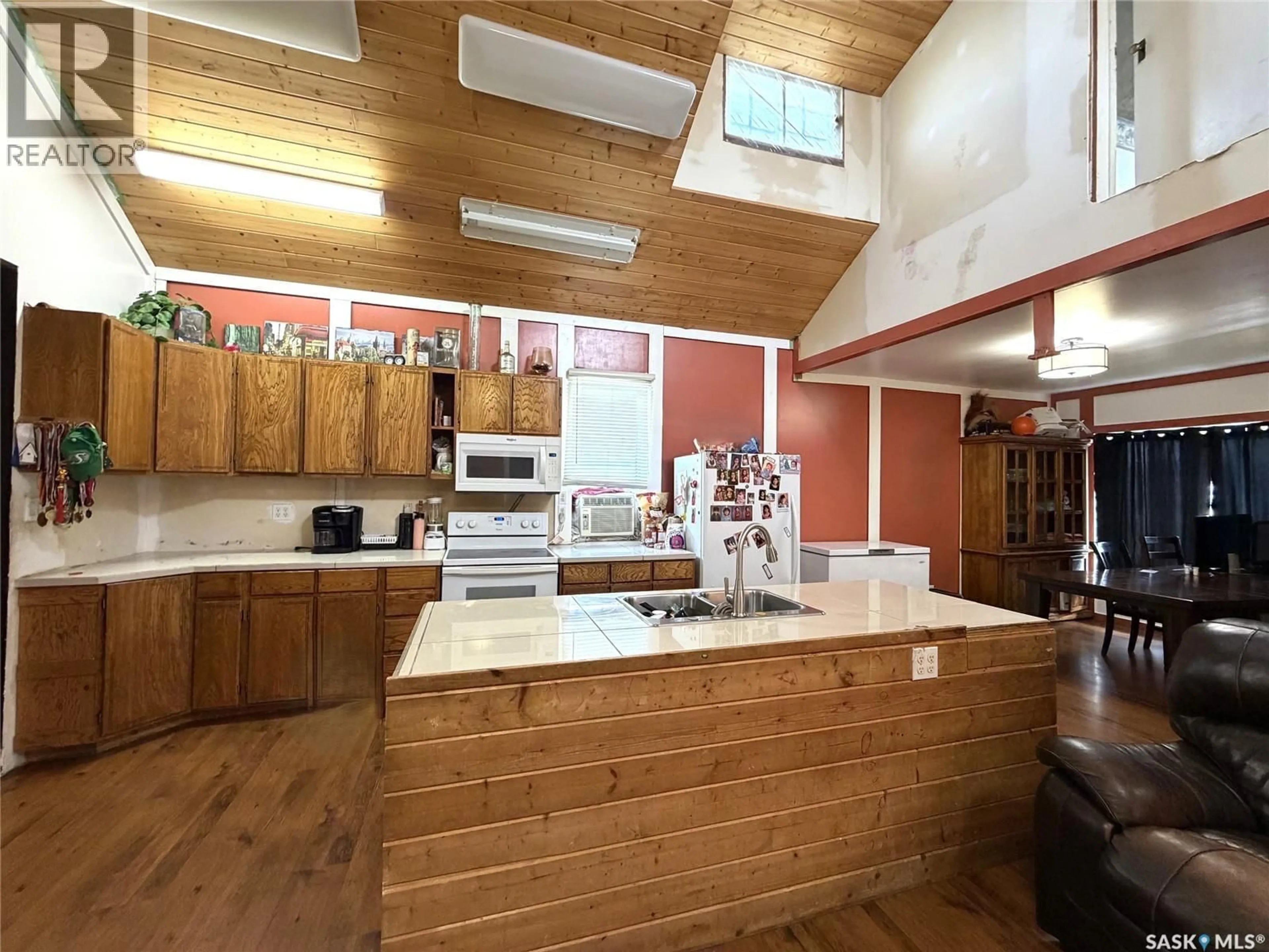Open concept kitchen, wood/laminate floor for 207 MAIN STREET, Hudson Bay Saskatchewan S0E0Y0