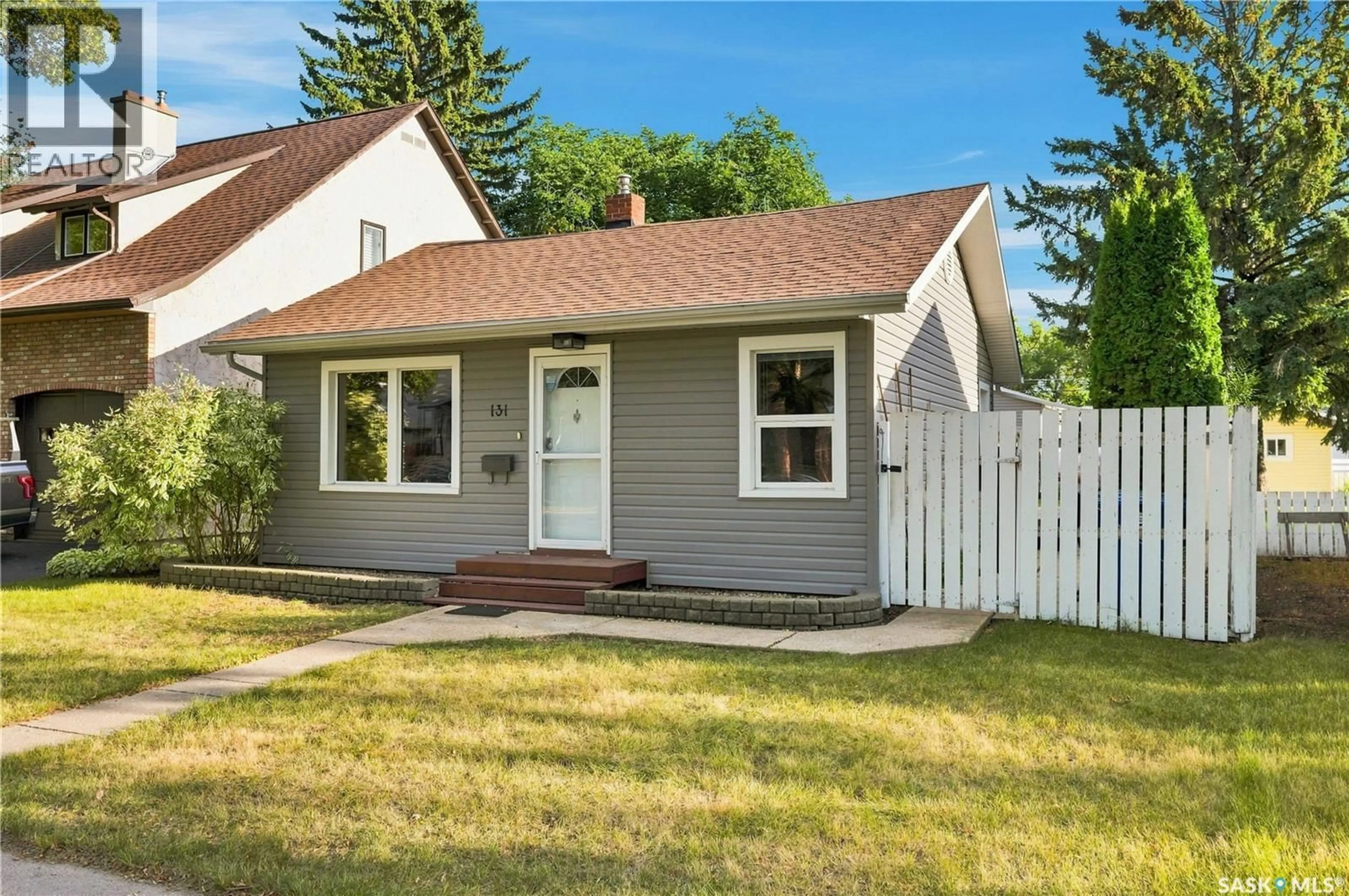 Home with vinyl exterior material, street for 131 112TH STREET, Saskatoon Saskatchewan S7N1V1