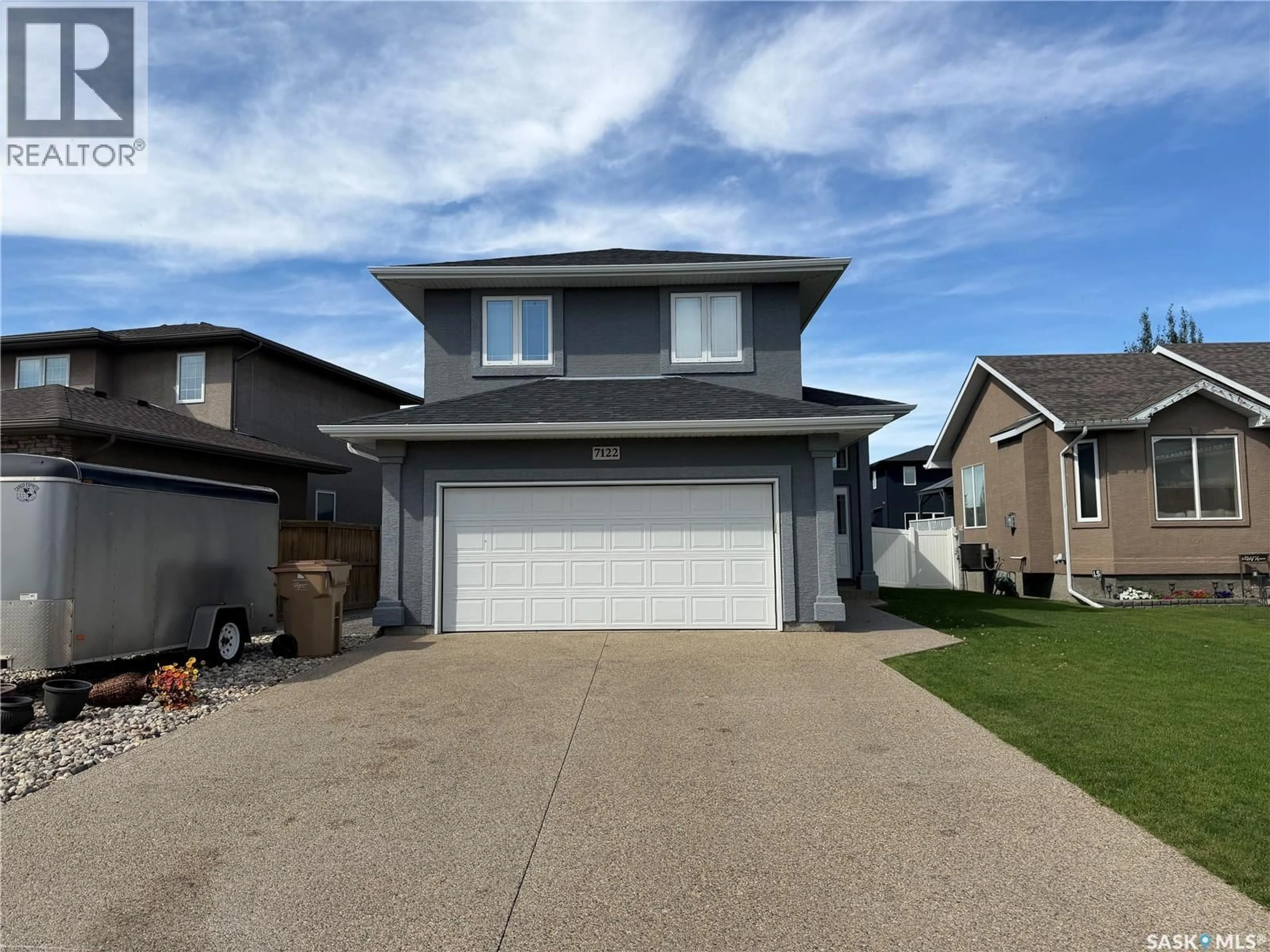 Home with vinyl exterior material, street for 7122 MAPLE VISTA DRIVE, Regina Saskatchewan S4X0E9