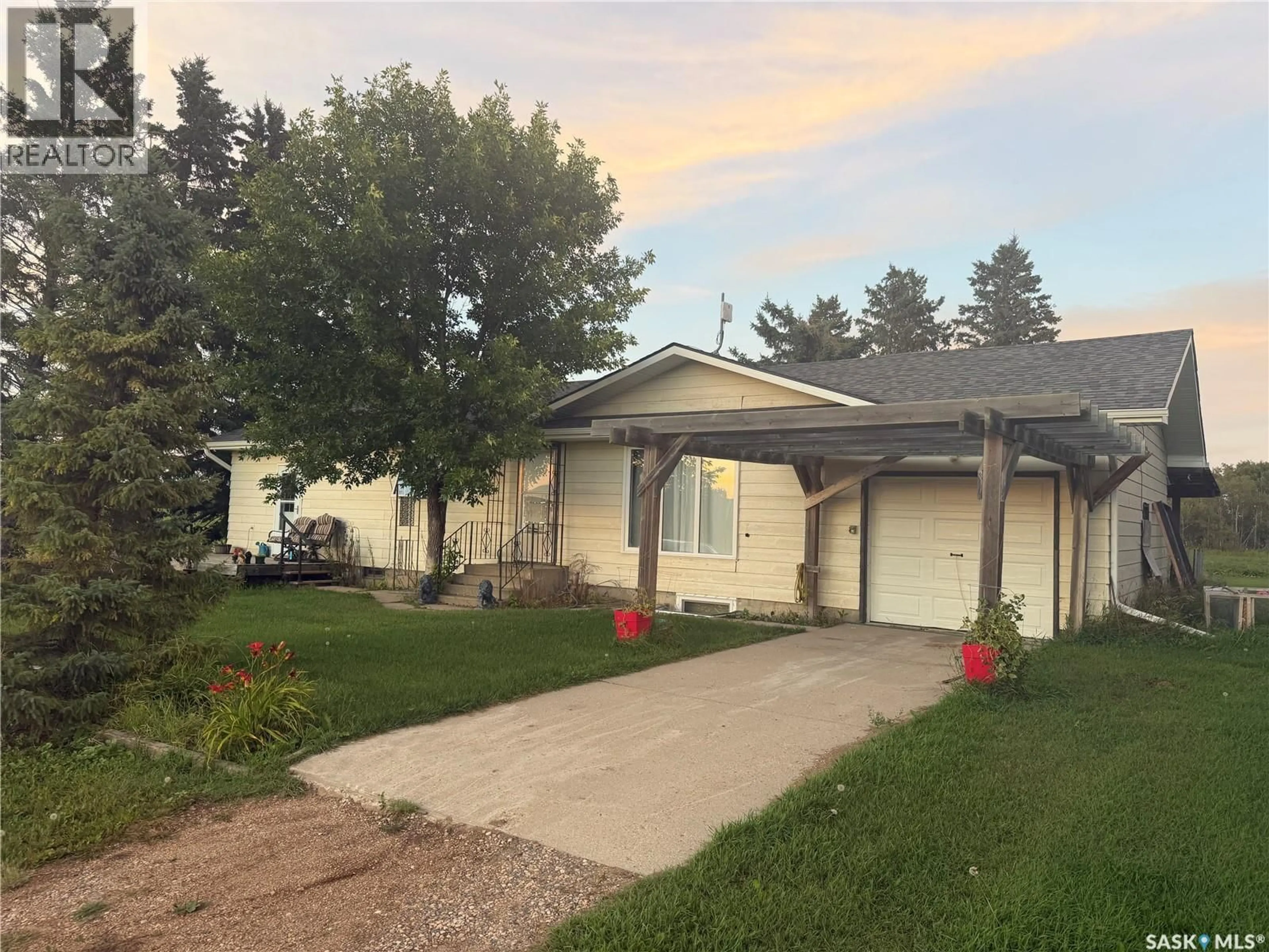 A pic from outside/outdoor area/front of a property/back of a property/a pic from drone, street for THIESSEN ACREAGE, Laird Rm No. 404 Saskatchewan S0K3R0