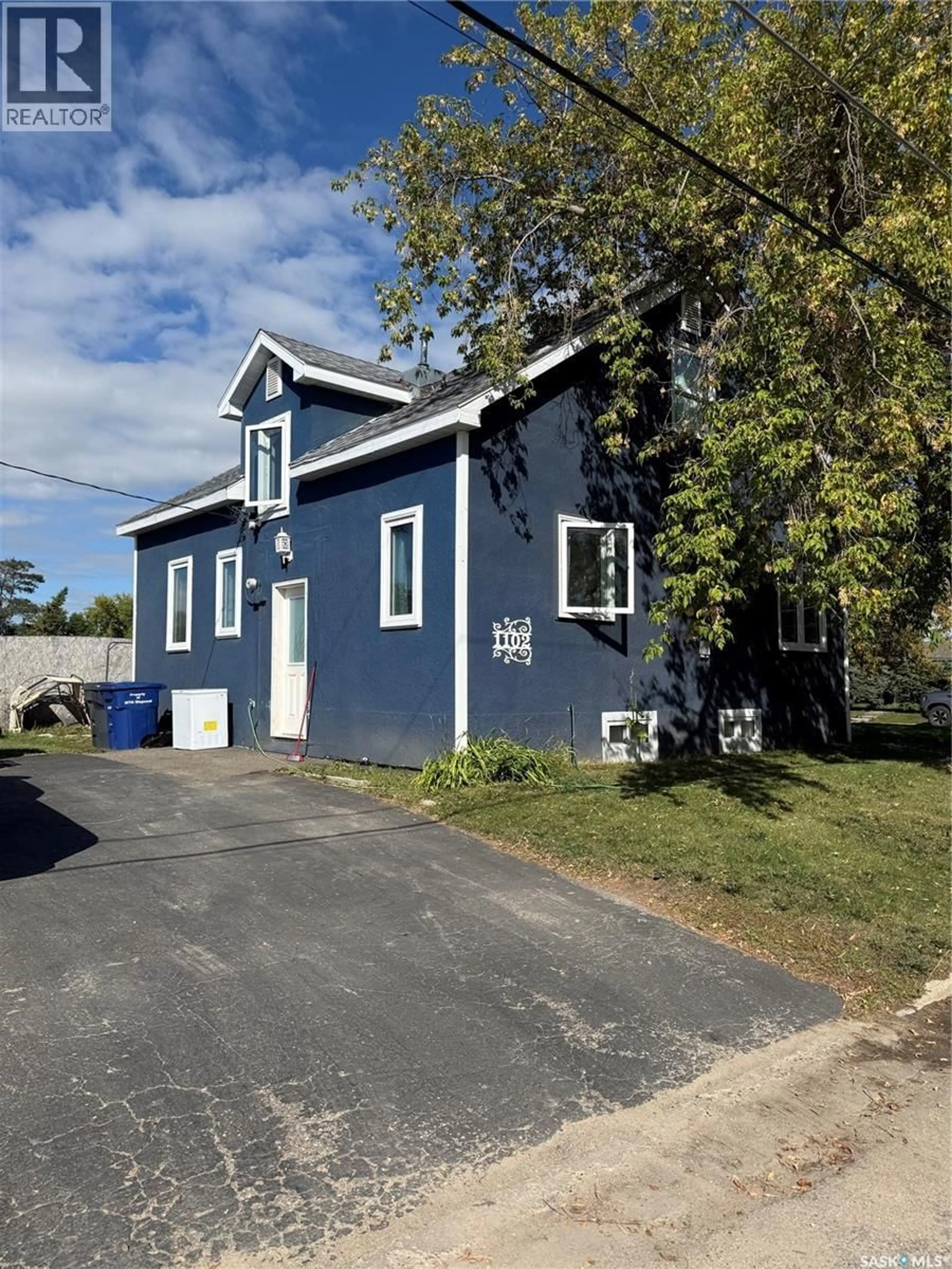 Home with vinyl exterior material, street for 1102 1ST STREET, Carrot River Saskatchewan S0E0L0