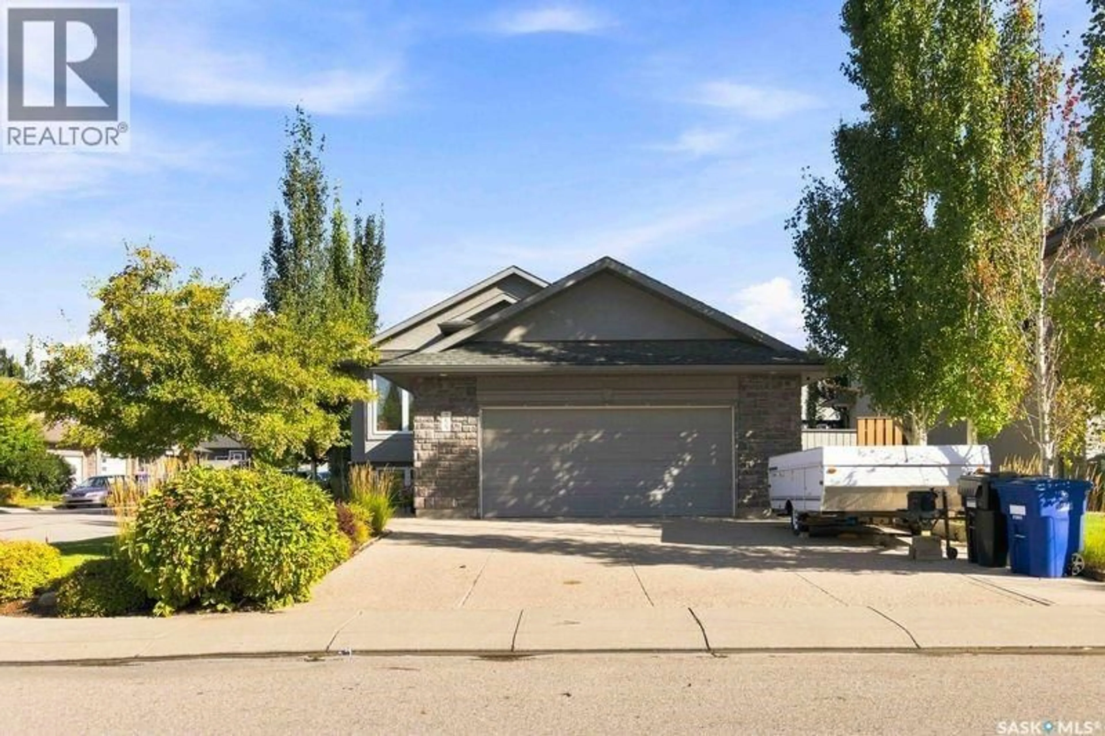 Home with vinyl exterior material, street for 755 SUTTER CRESCENT, Saskatoon Saskatchewan S7T0R5