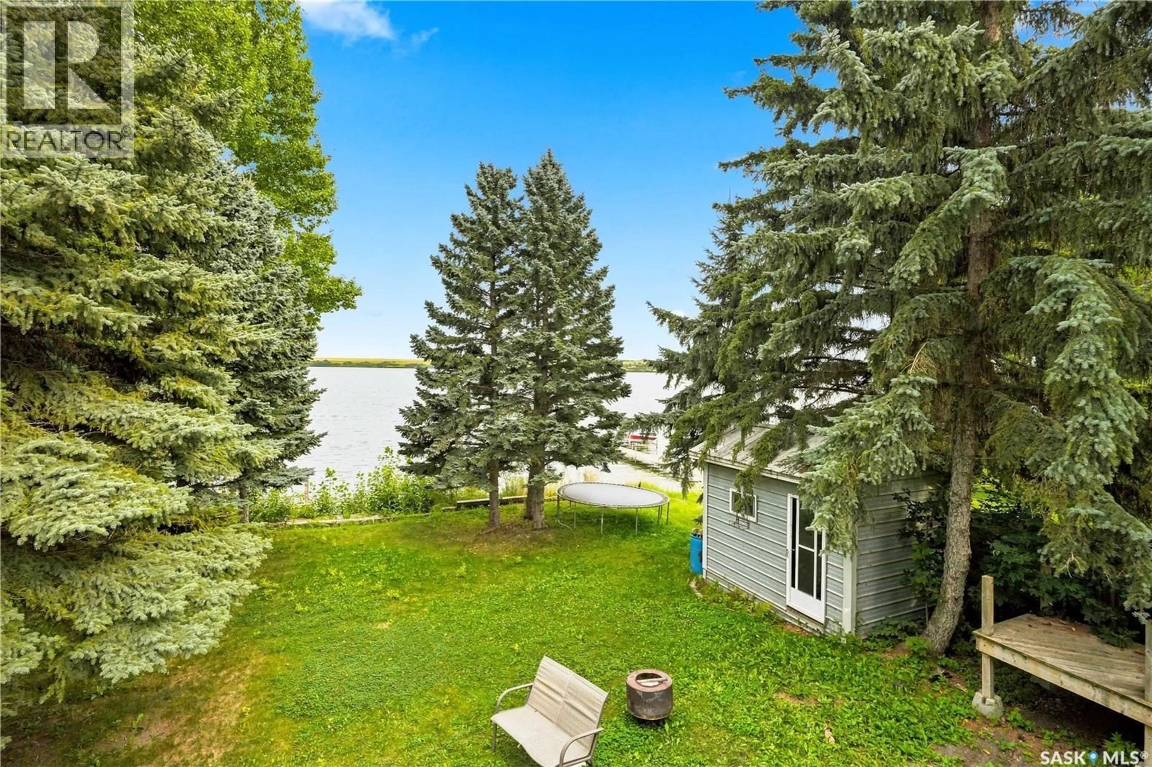 A pic from outside/outdoor area/front of a property/back of a property/a pic from drone, water/lake/river/ocean view for 19 MAWSON DRIVE, Shields Saskatchewan S7C0A1