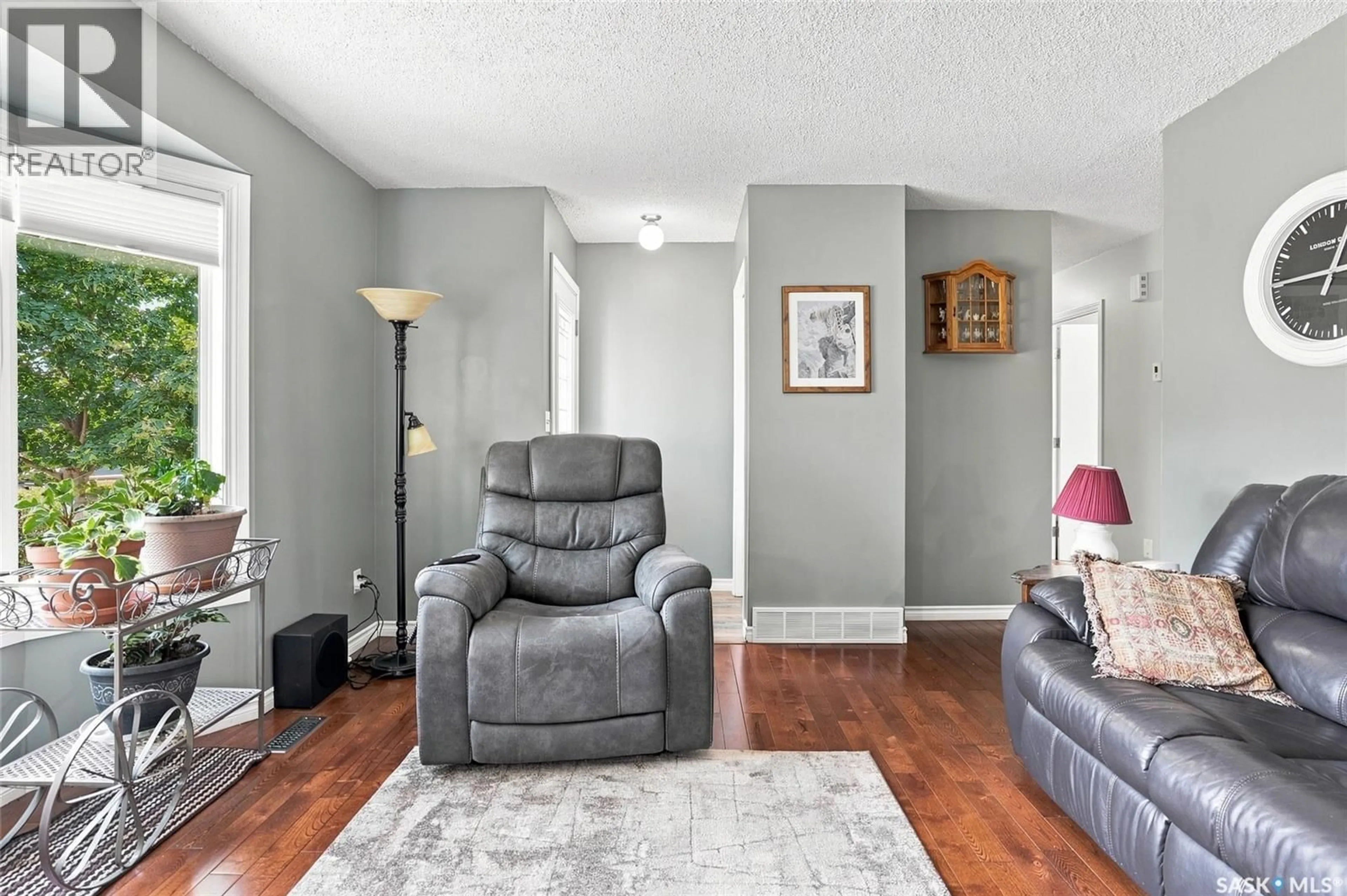 Living room with furniture, unknown for 742 KLASSEN BAY, Martensville Saskatchewan S0K2T2