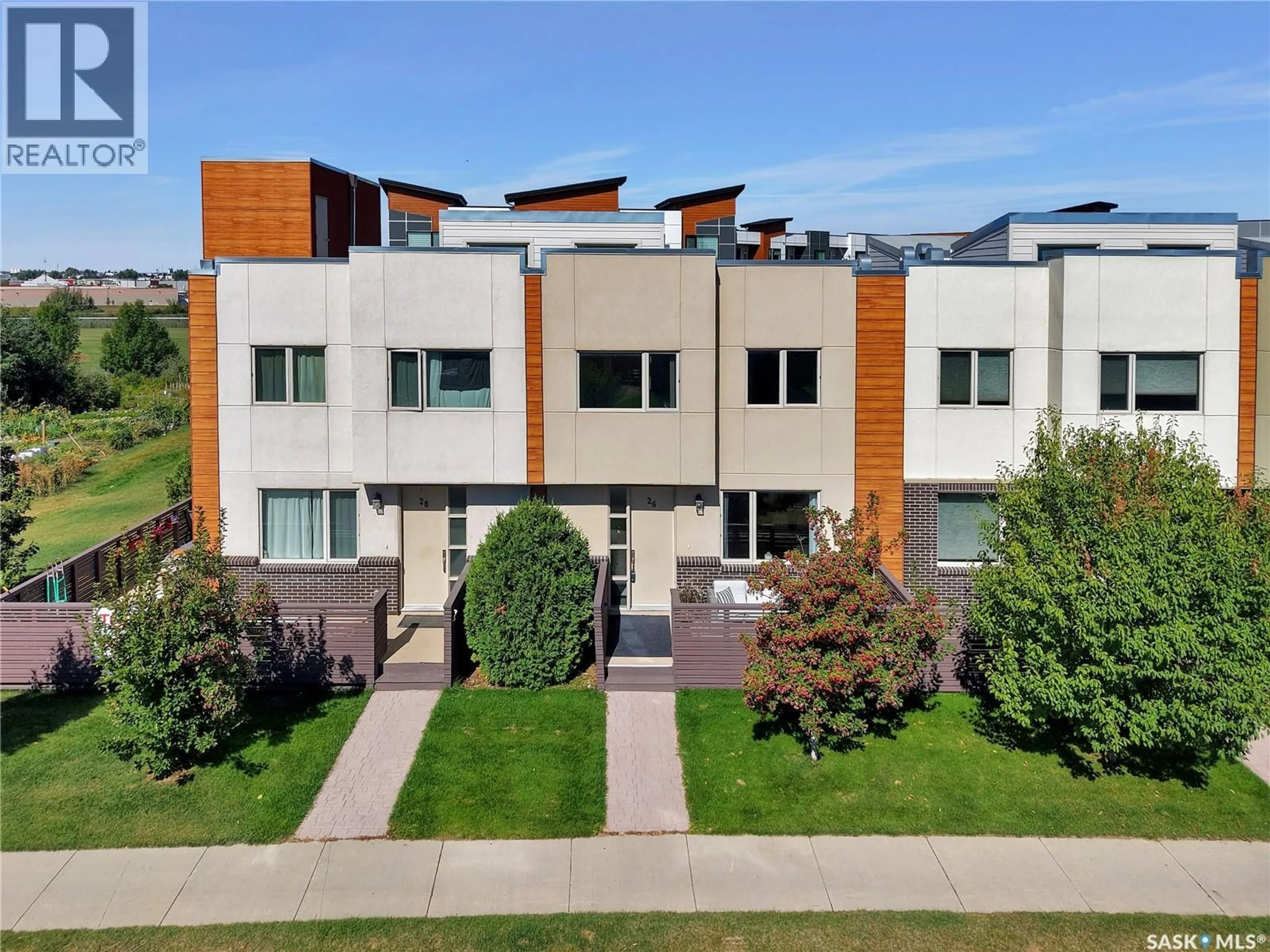 A pic from outside/outdoor area/front of a property/back of a property/a pic from drone, street for 26 103 WILLIS CRESCENT, Saskatoon Saskatchewan S7T0X9