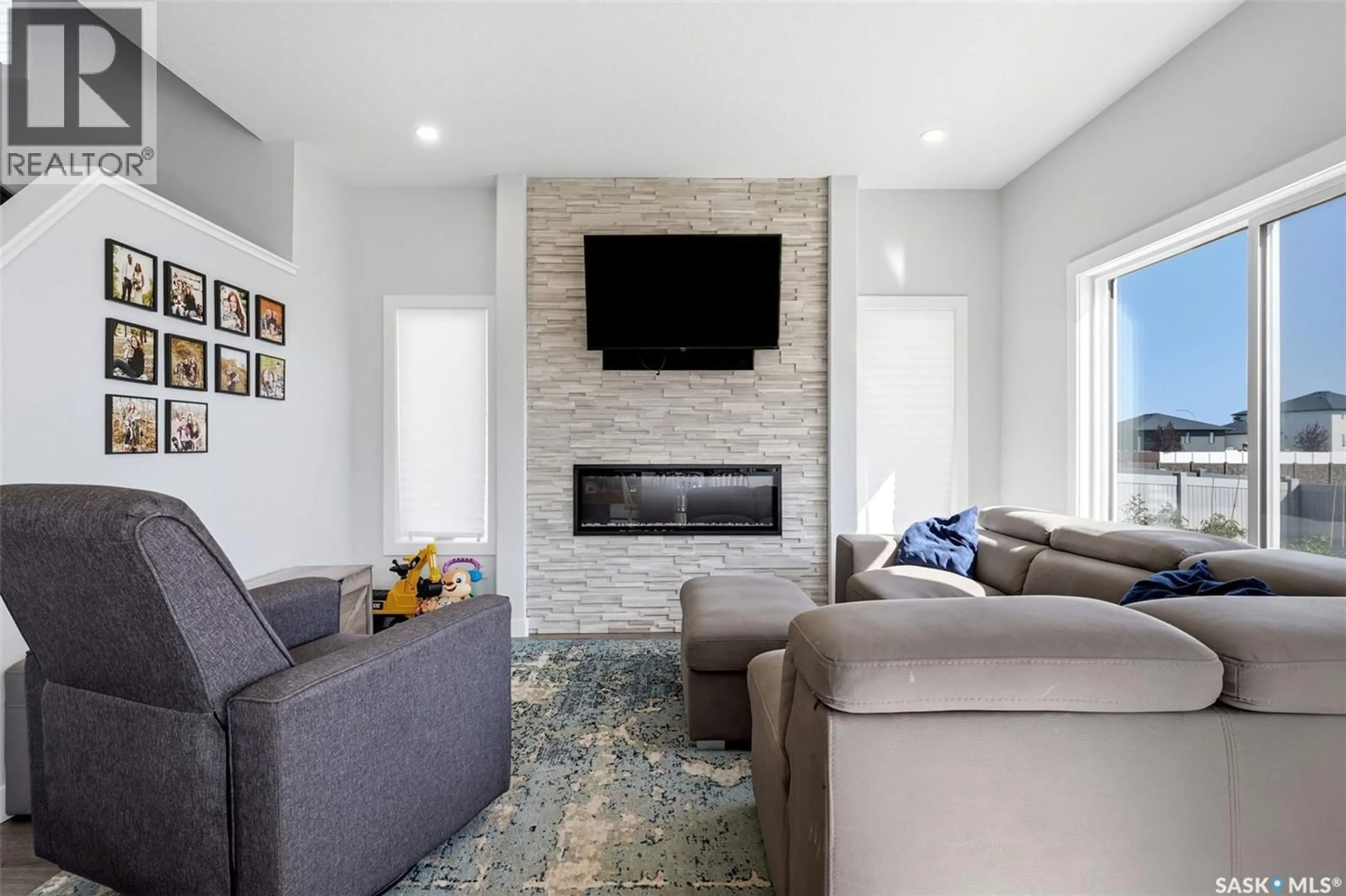 Living room with furniture, unknown for 34 MACKENZIE CRESCENT, Pilot Butte Saskatchewan S0G0Z0