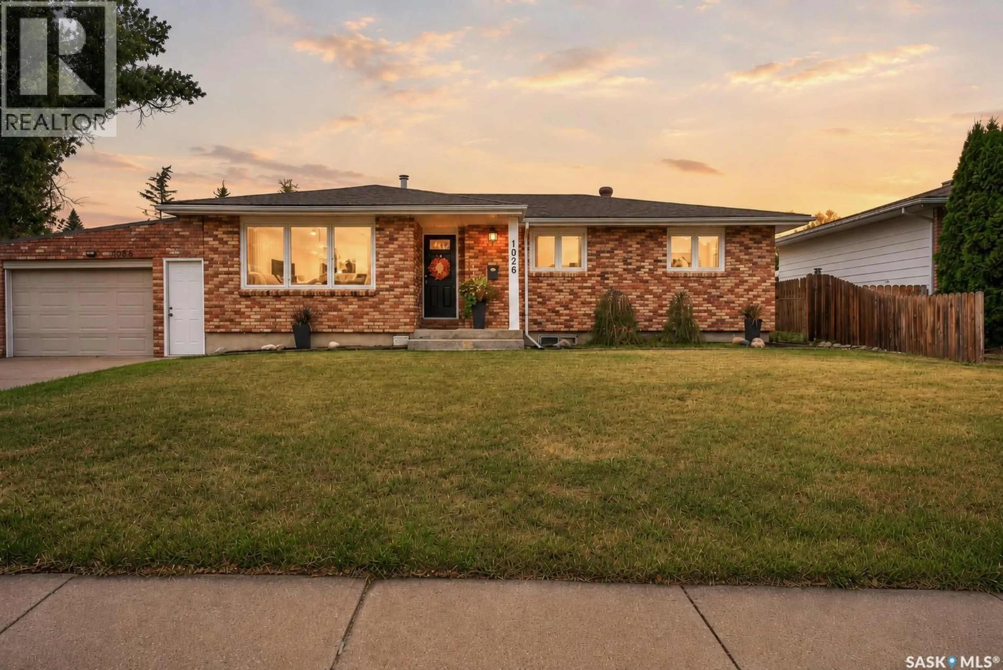 Home with brick exterior material, street for 1026 JAMES STREET, Moose Jaw Saskatchewan S6H3H7