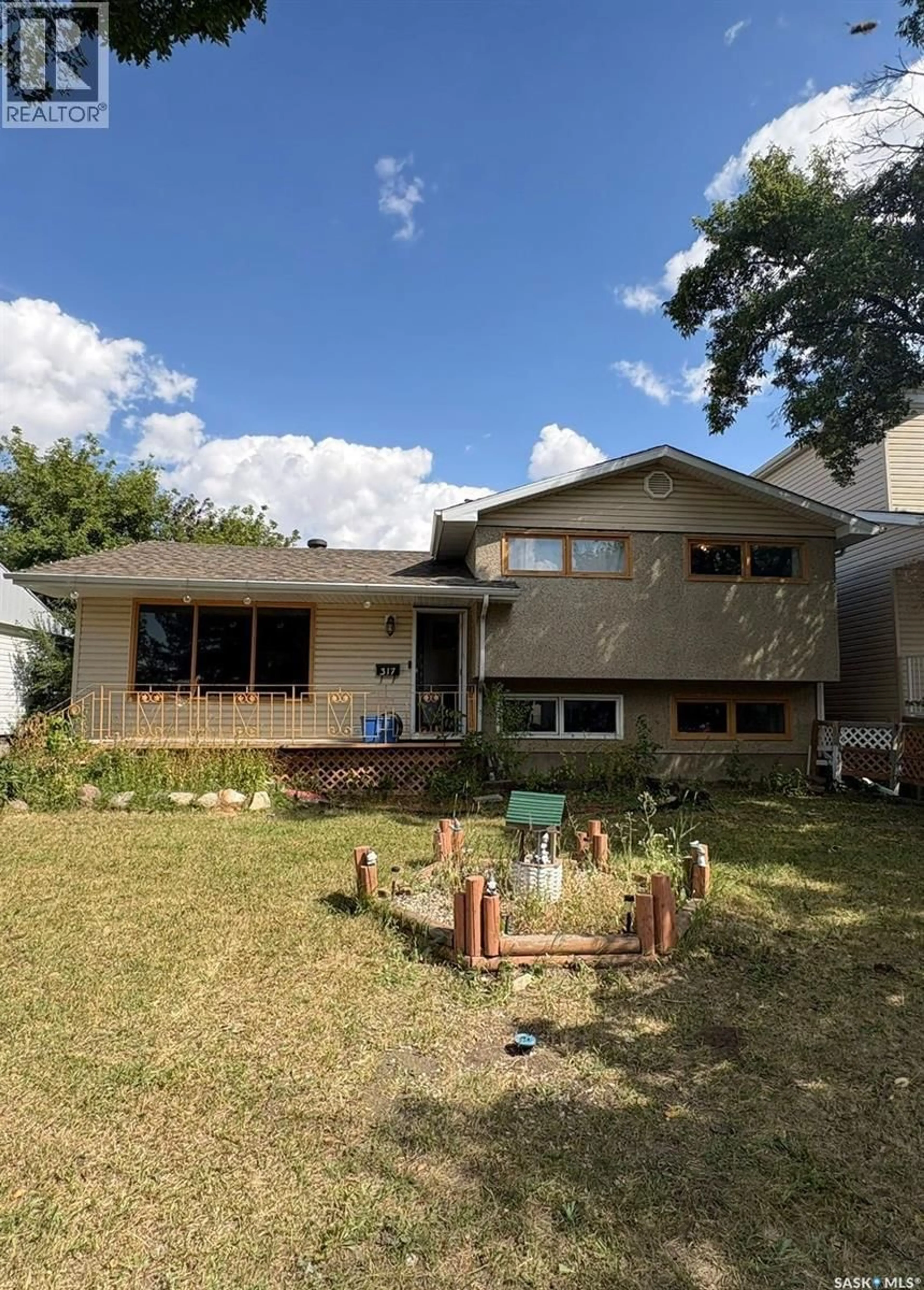 Home with vinyl exterior material, street for 317 HALIFAX STREET, Regina Saskatchewan S4R1T1